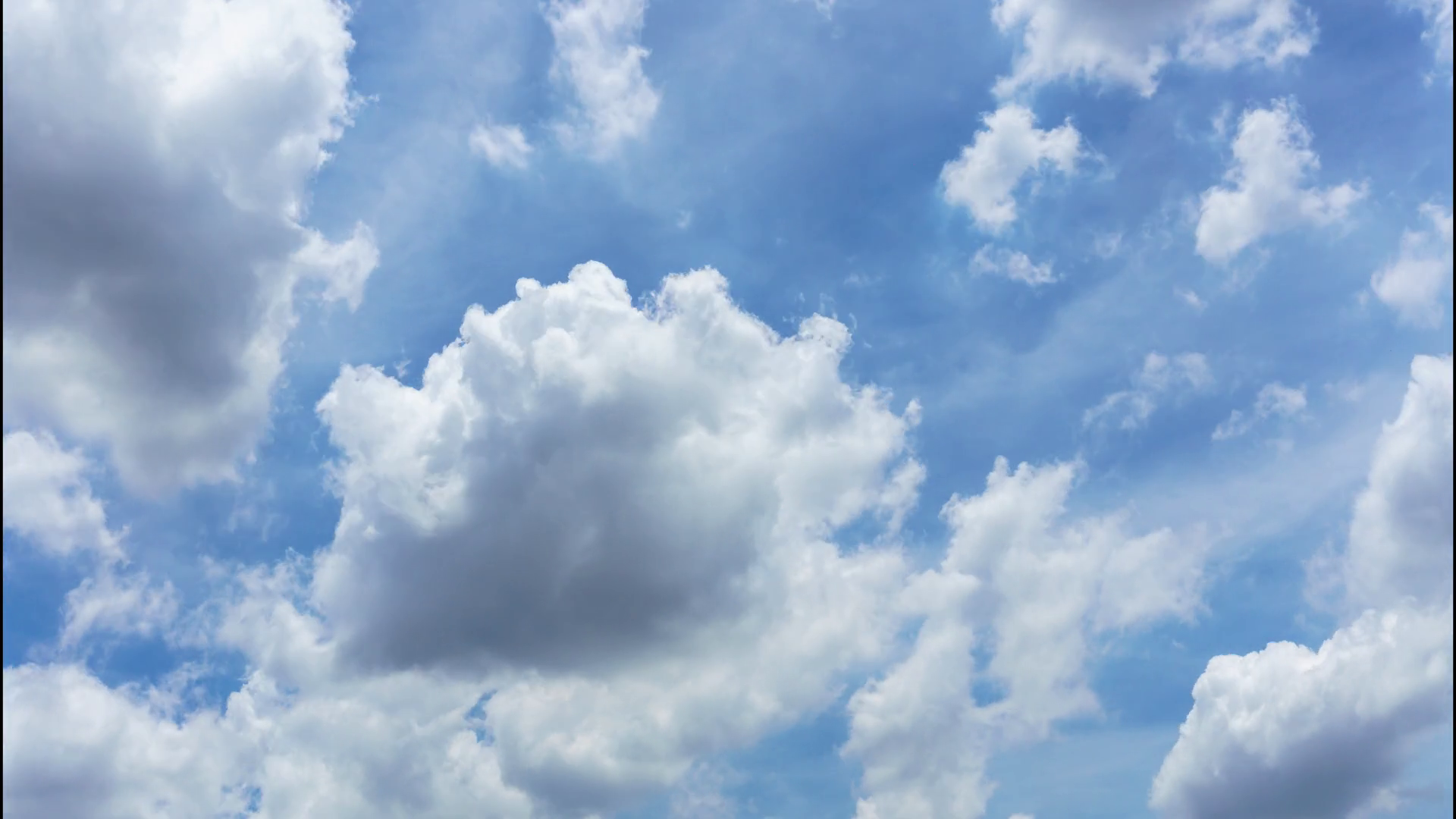 blue summer sky and clouds background Stock Video Footage - Videoblocks