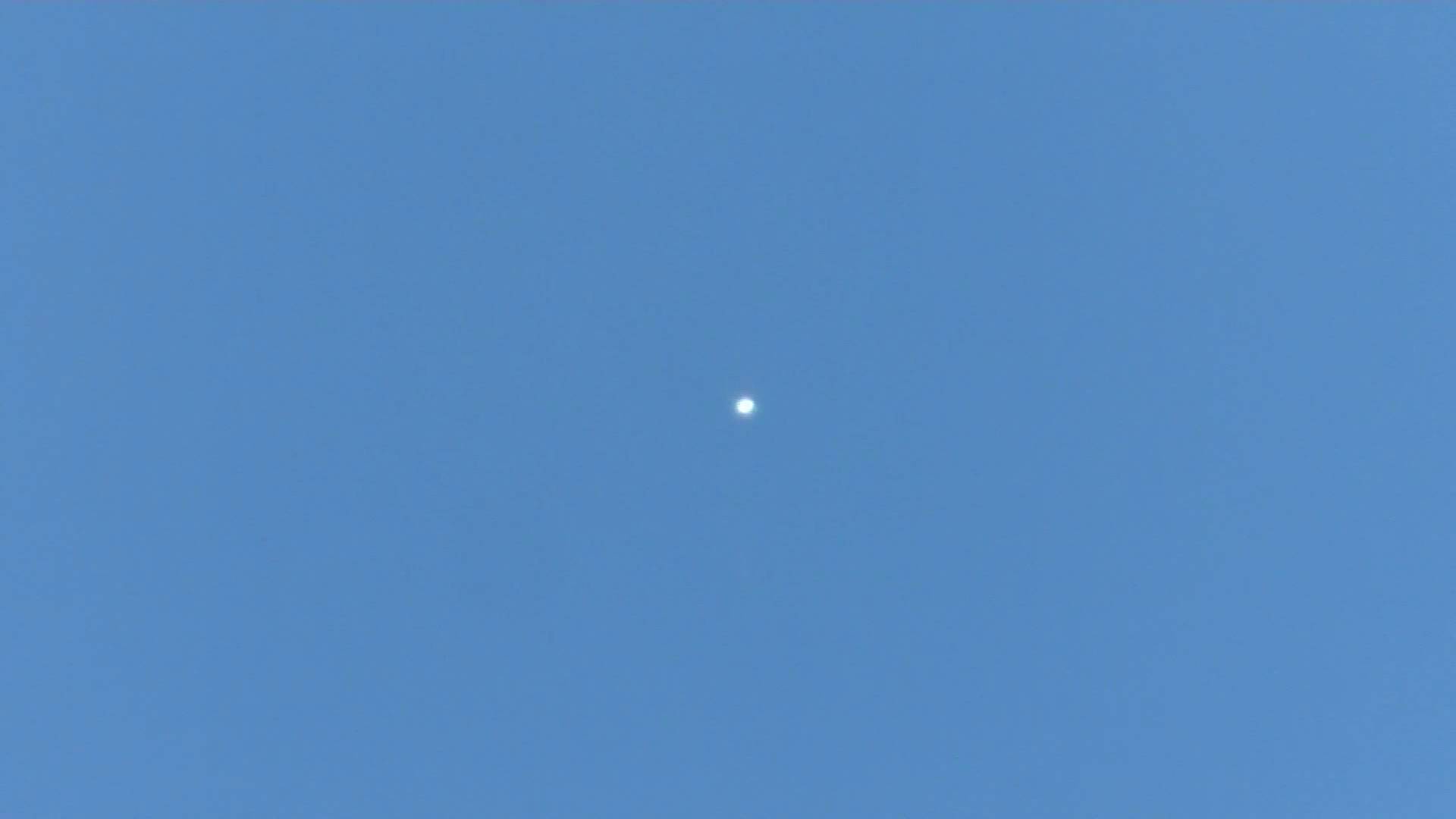 Daylight sighting in Adelaide, bright white orb with a small ...