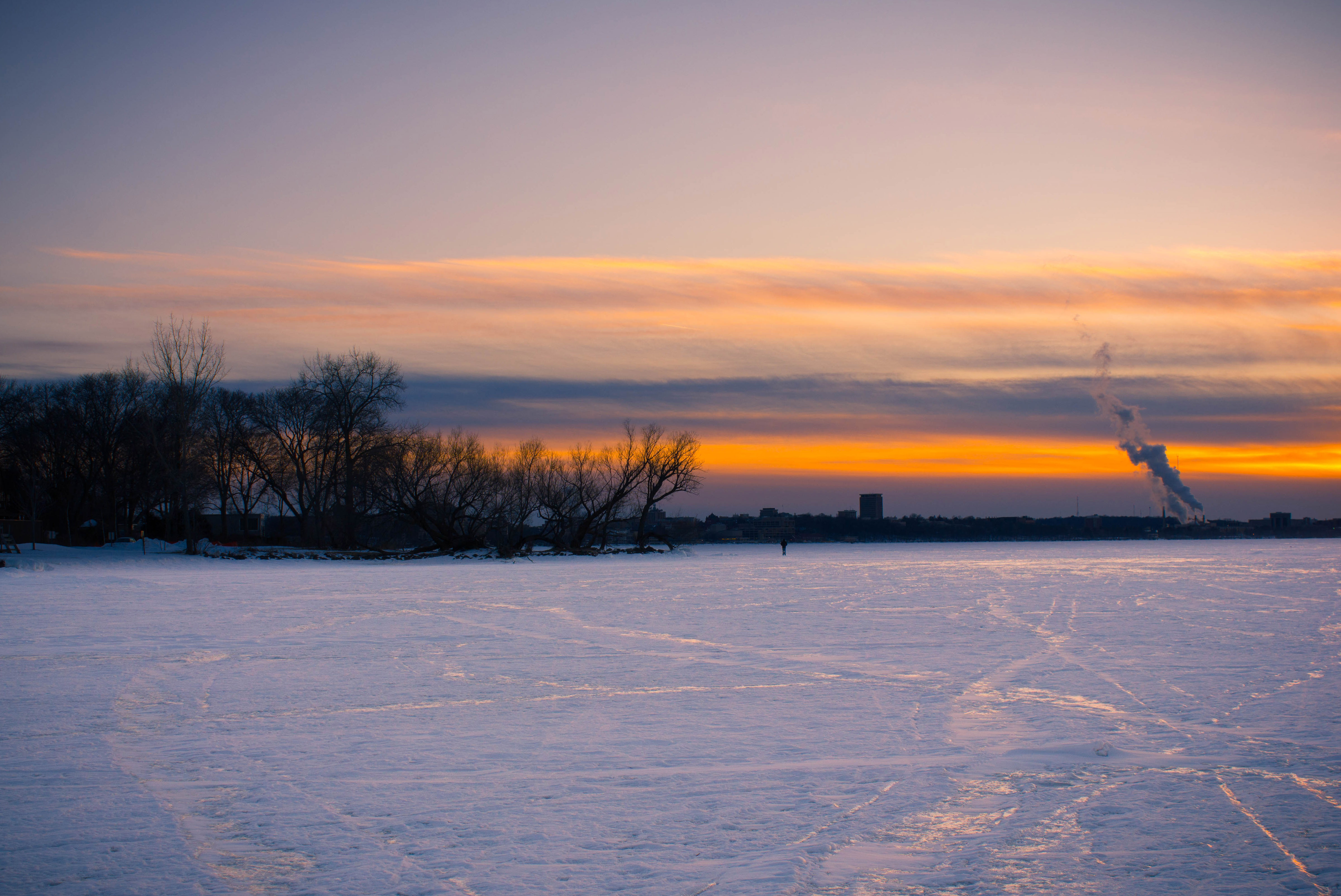Dusk over the frozen lake landscape on Lake Mendota, Madison ...