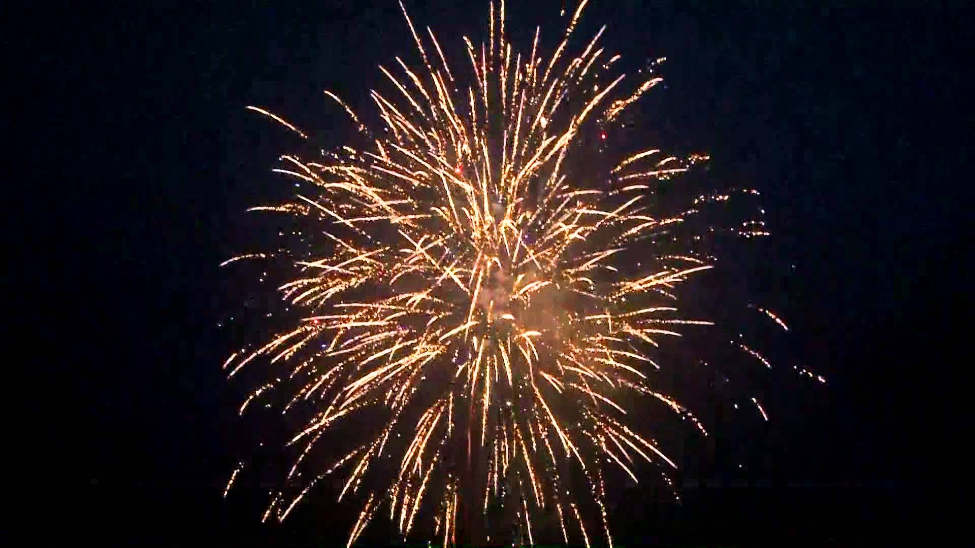 100 shots cake fireworks light the night sky - YouTube