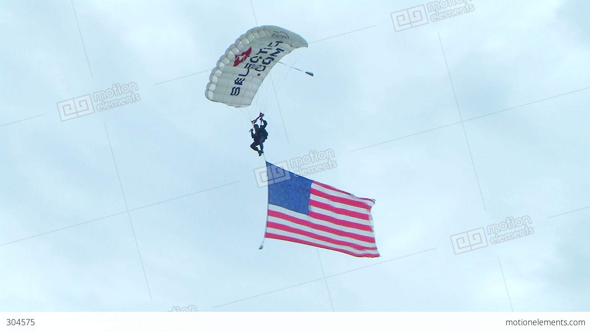 Skydiver Parachuting With Flag Stock video footage | 304575