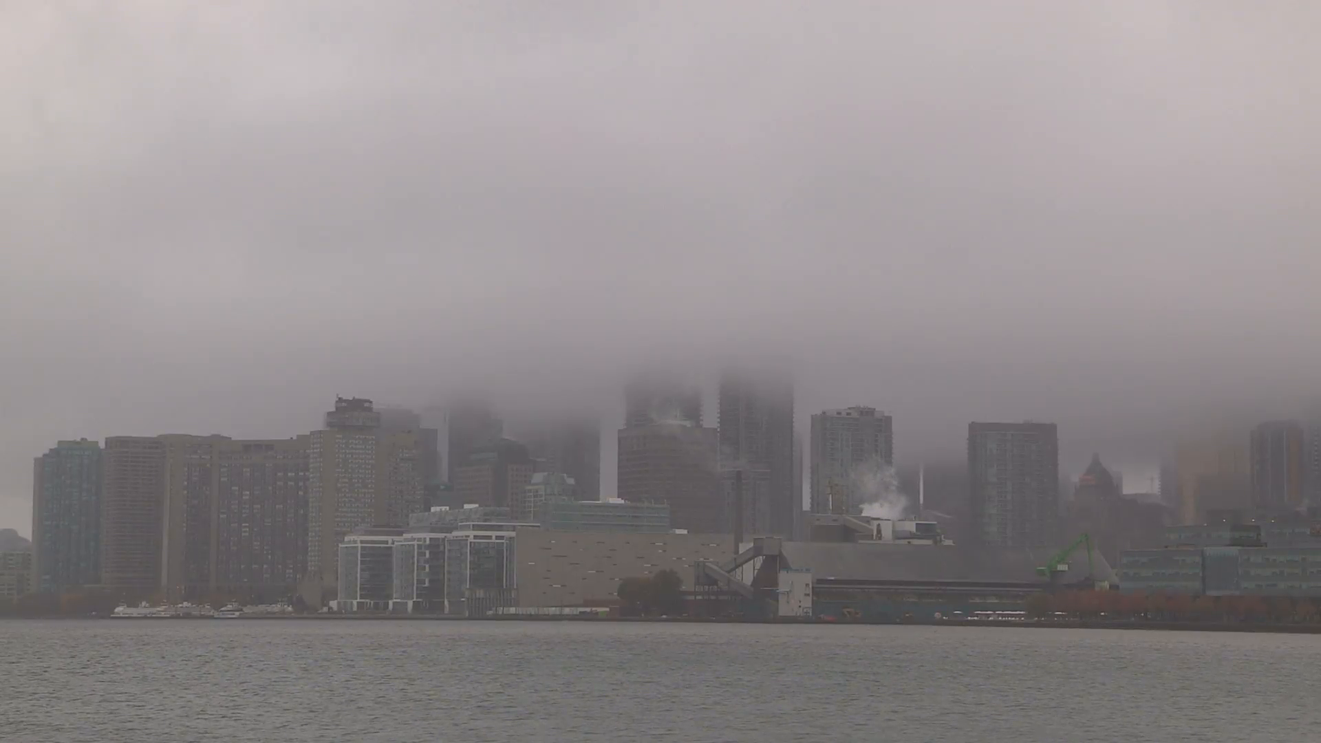 Low cloud and fog block out the CN tower and Toronto skyline Stock ...