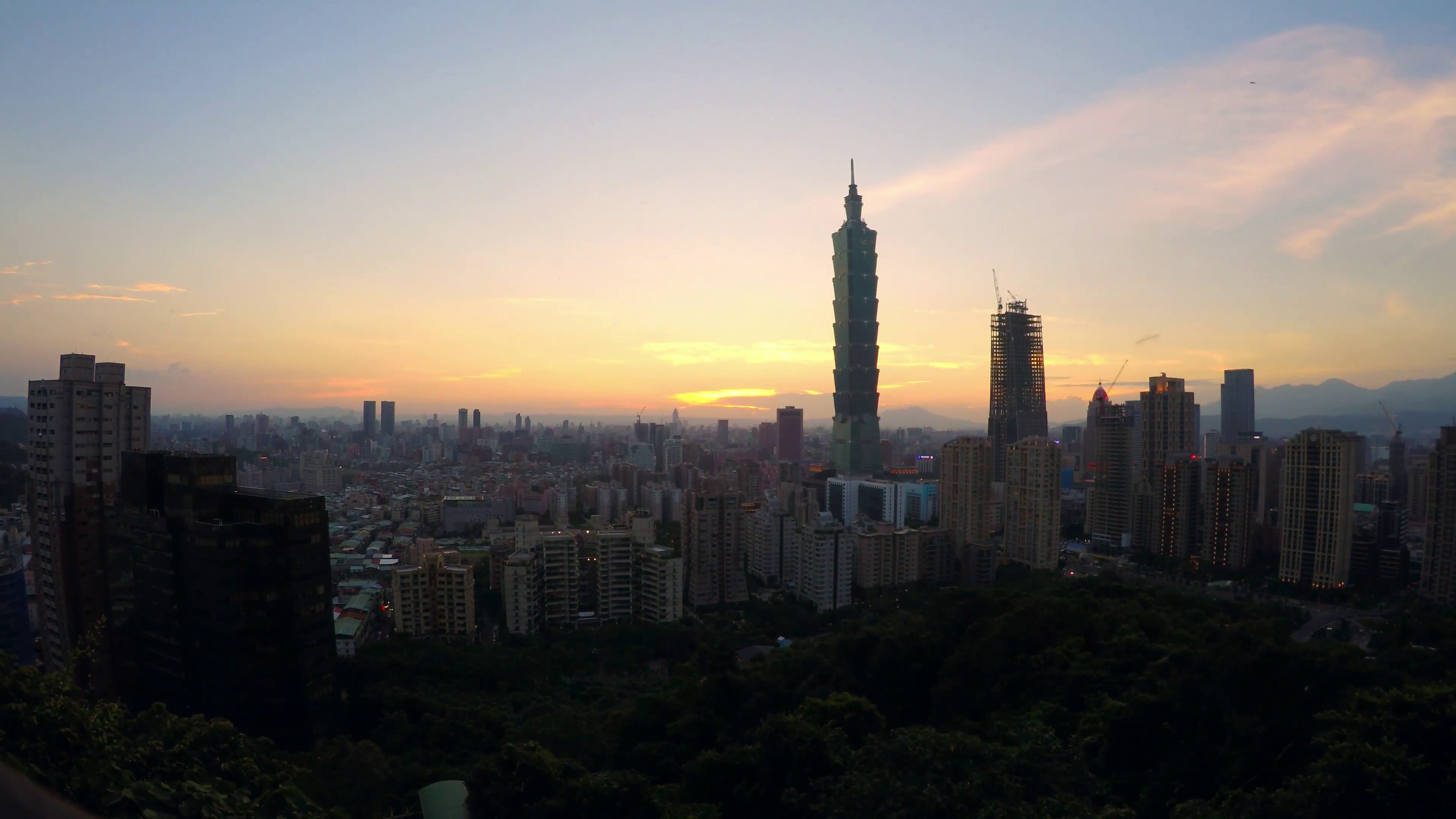 Timelapse Aerial day to night, View of landscape building Taipei 101 ...