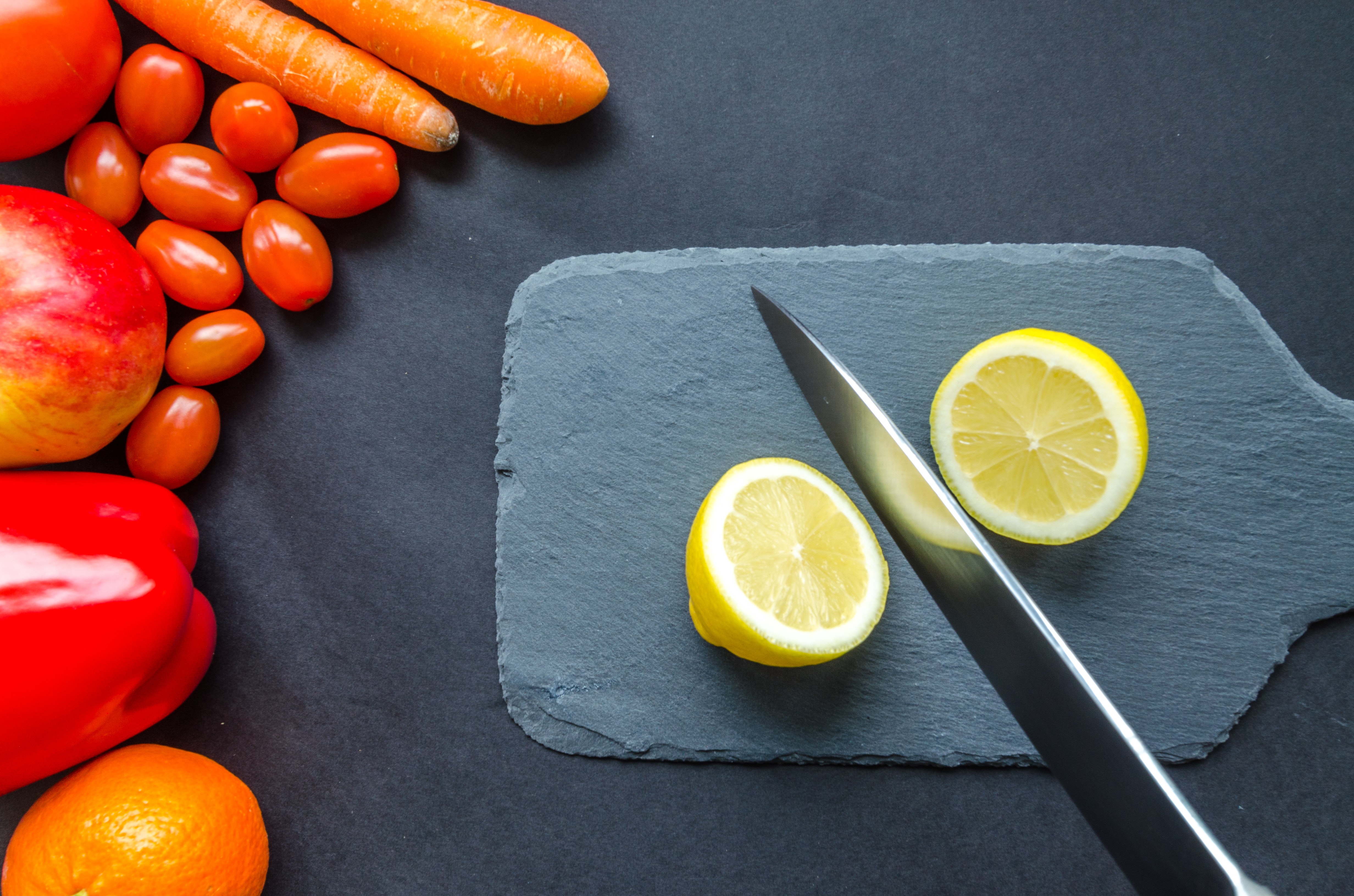 Sliced lemon on gray chopping board photo