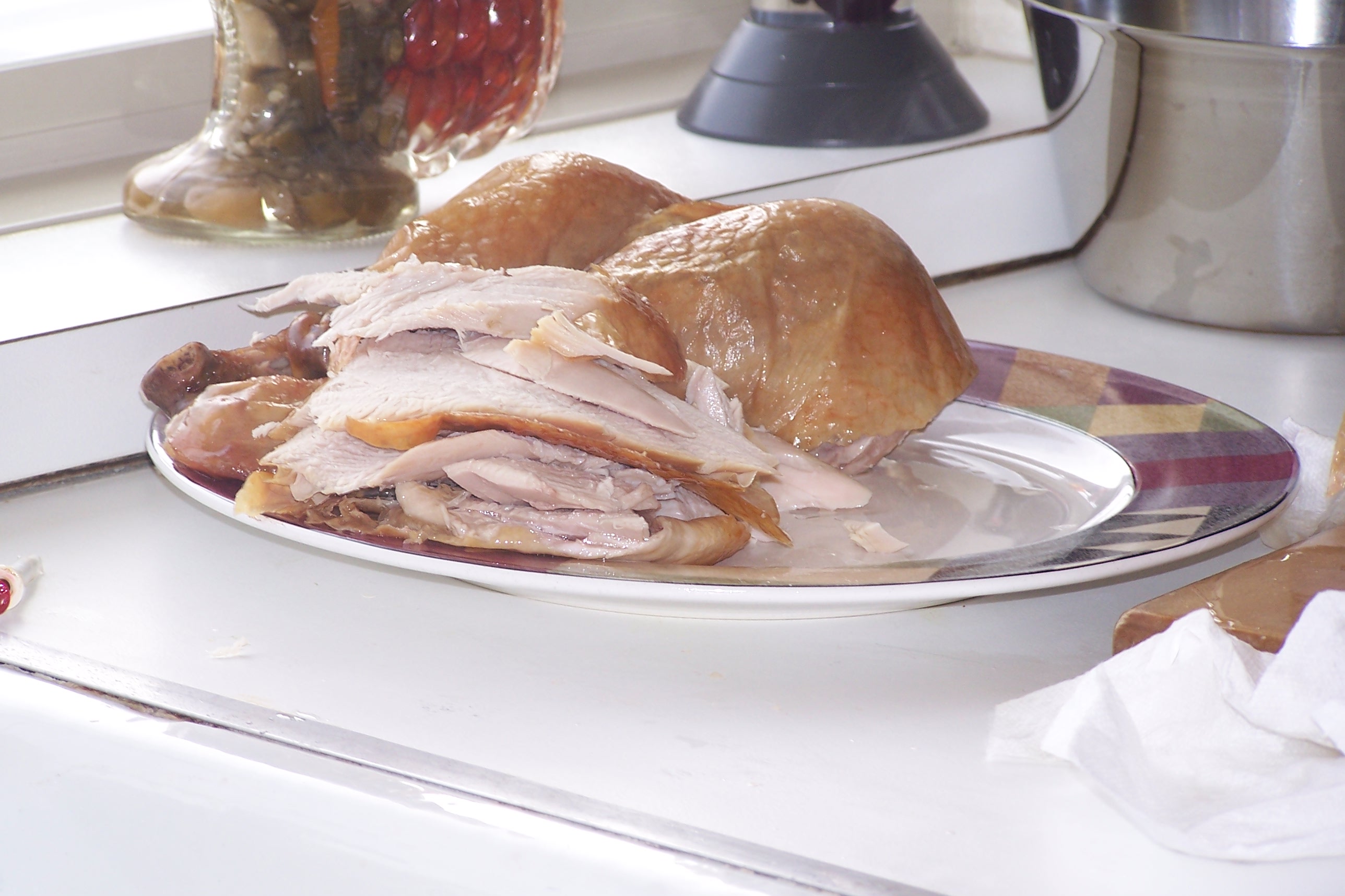 Sliced turkey on plate photo