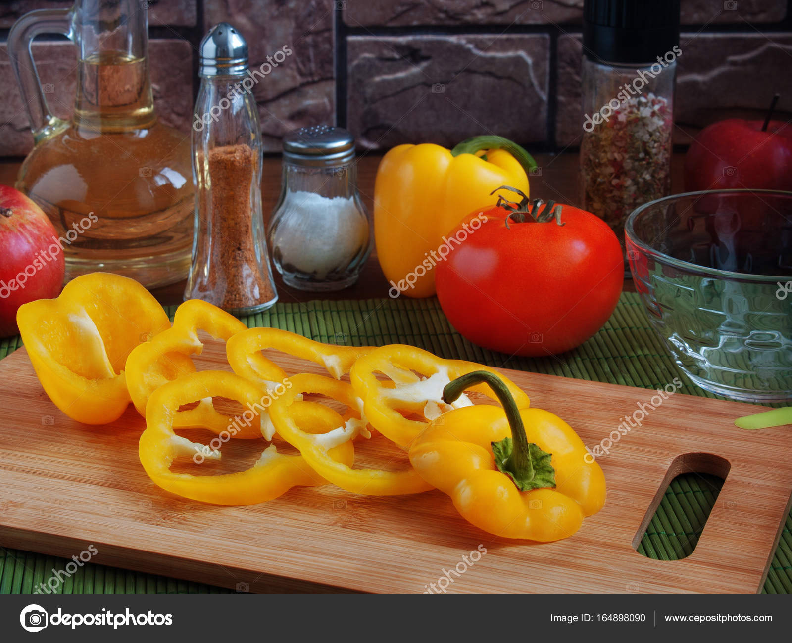 Juicy sliced yellow pepper rings on the board — Stock Photo ...