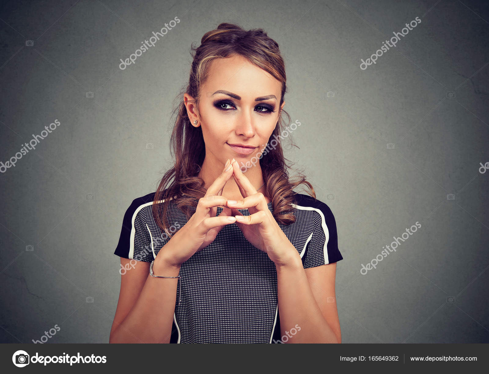 sly, scheming woman plotting something — Stock Photo © SIphotography ...