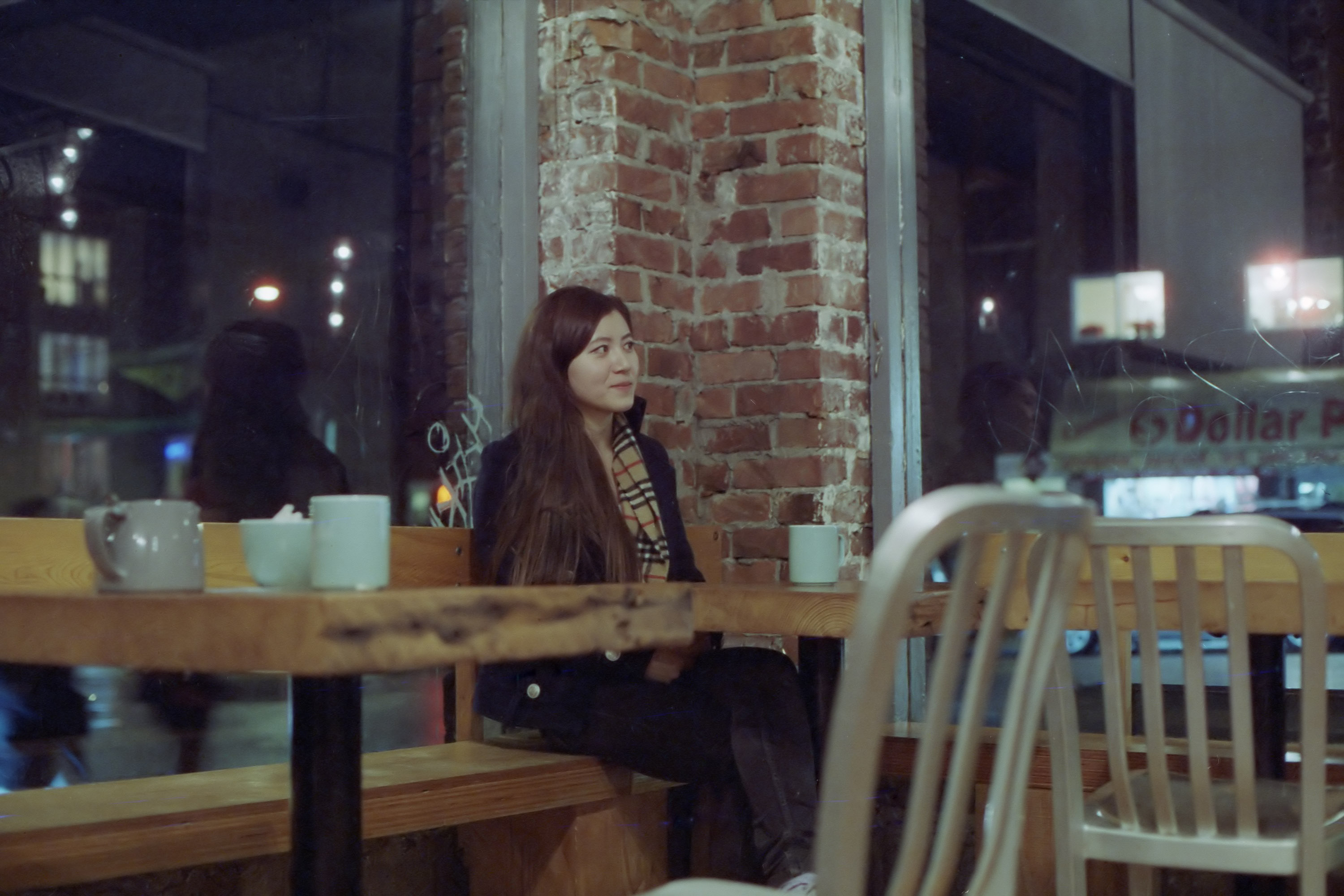 Smirking at a cafe photo