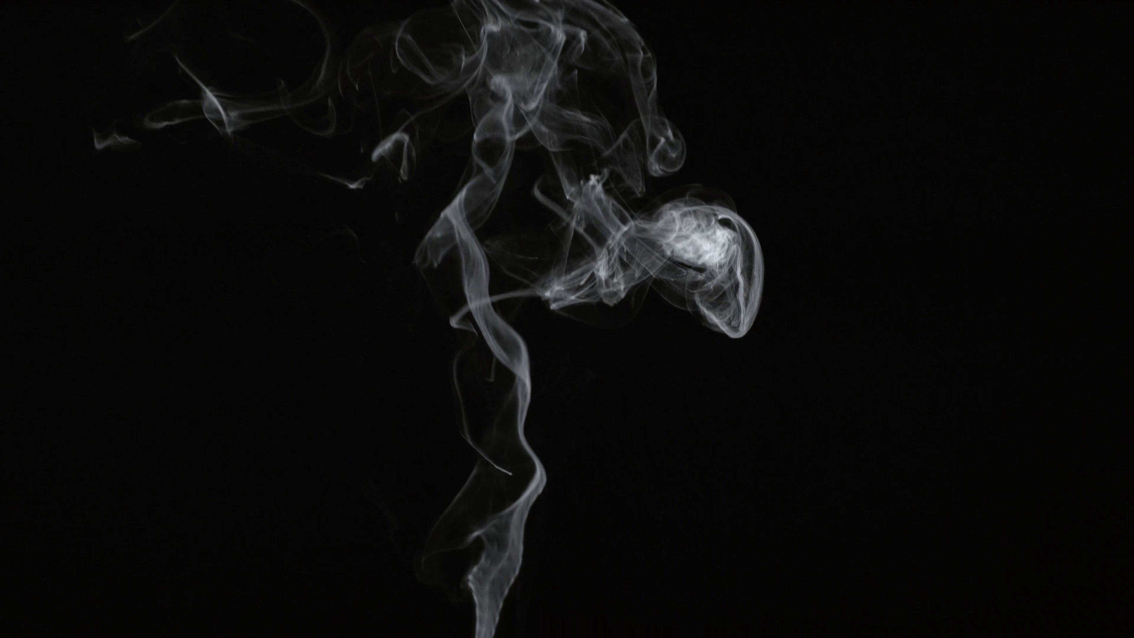 Smoke on black background in slow motion; shot on Phantom Flex 4K at ...