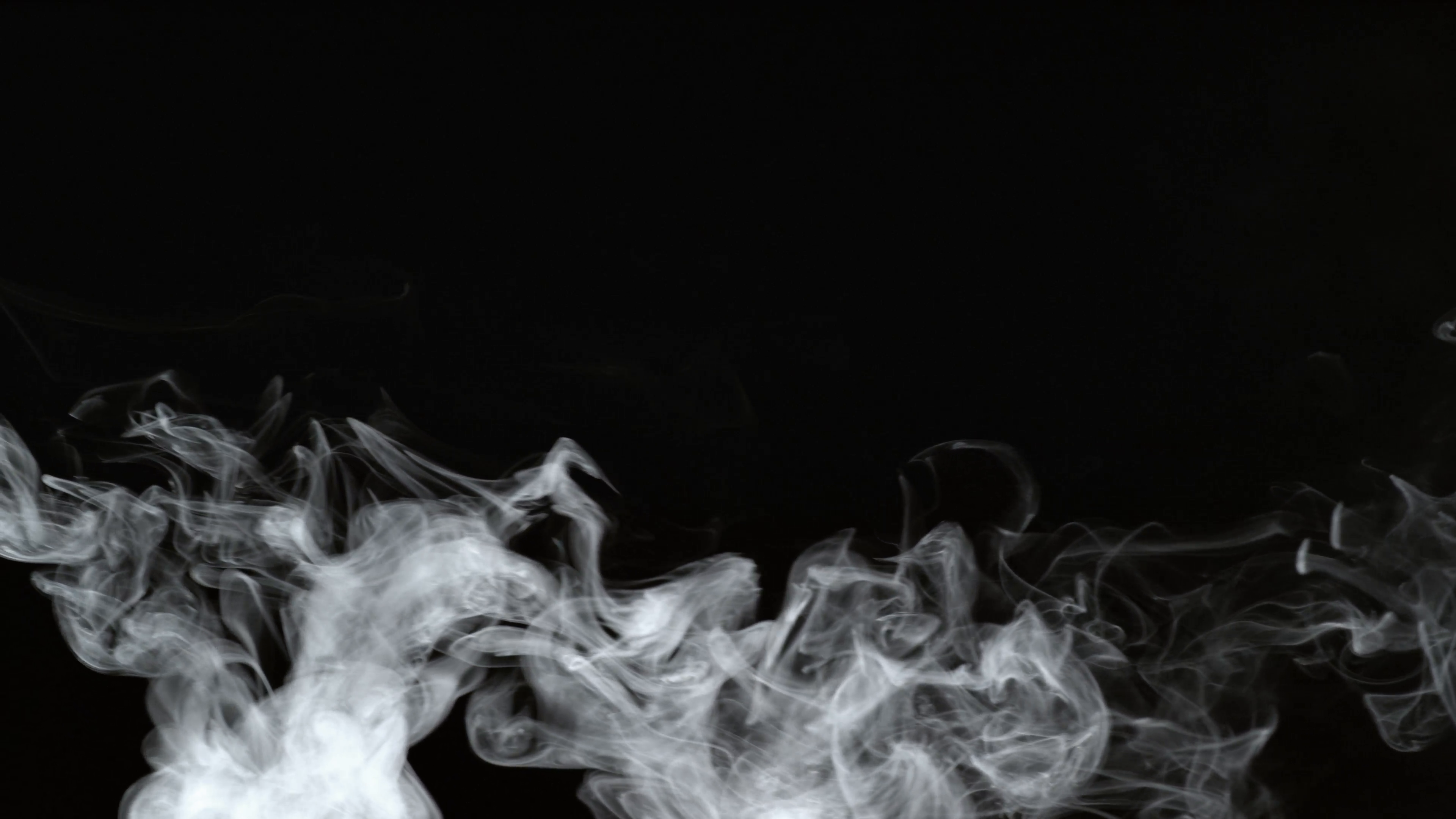 Smoke on black background in slow motion; shot on Phantom Flex 4K at ...
