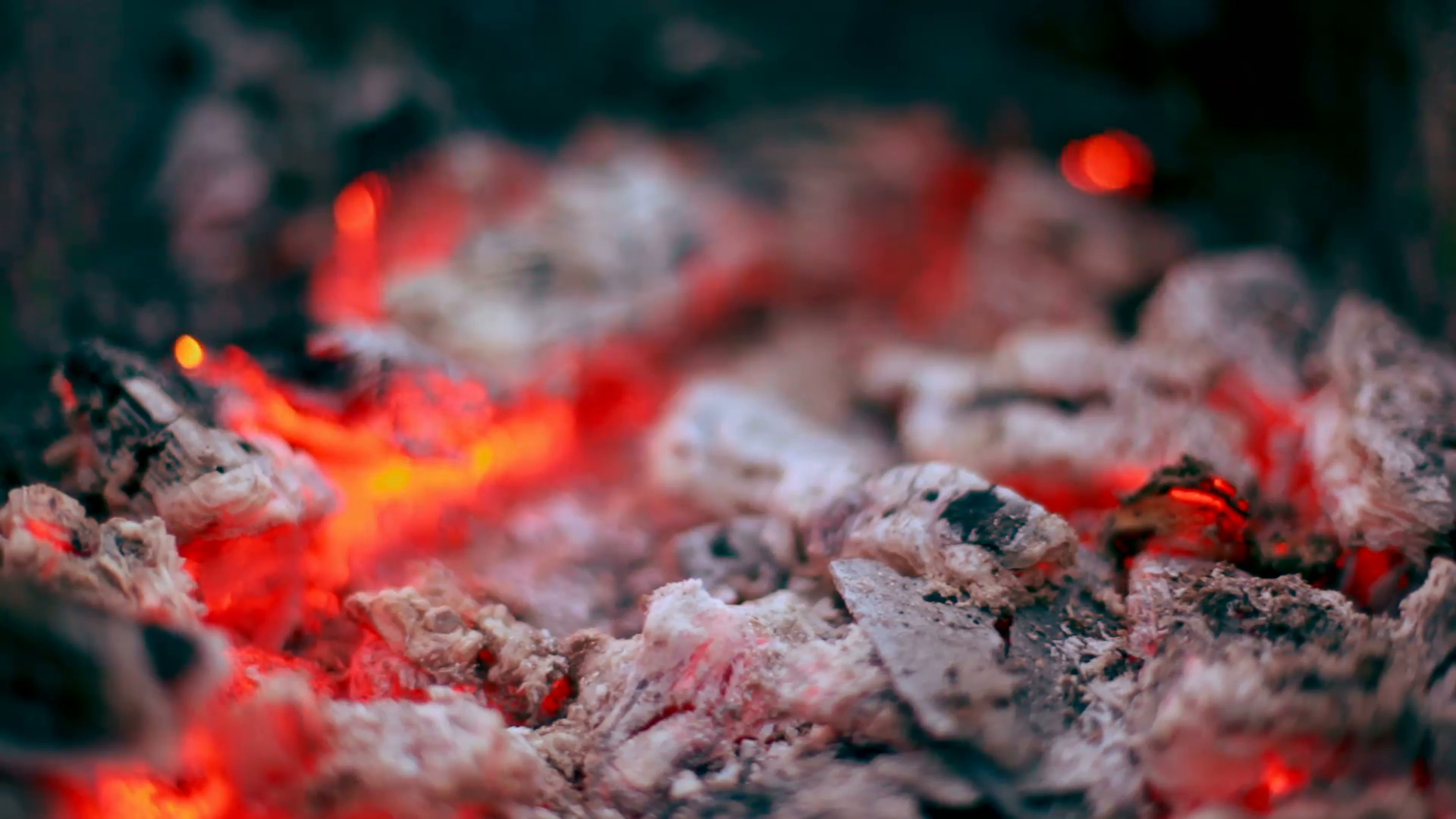 Flicker of smoldering coals lay in cinder, closeup view Stock Video ...