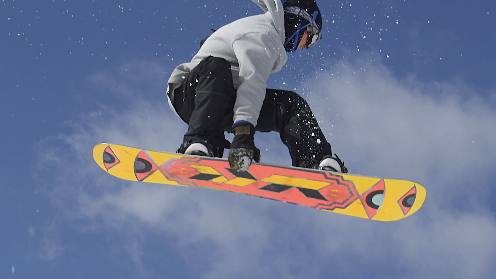 SLOW MOTION: Snowboarder jumping over the camera Stock Video Footage ...