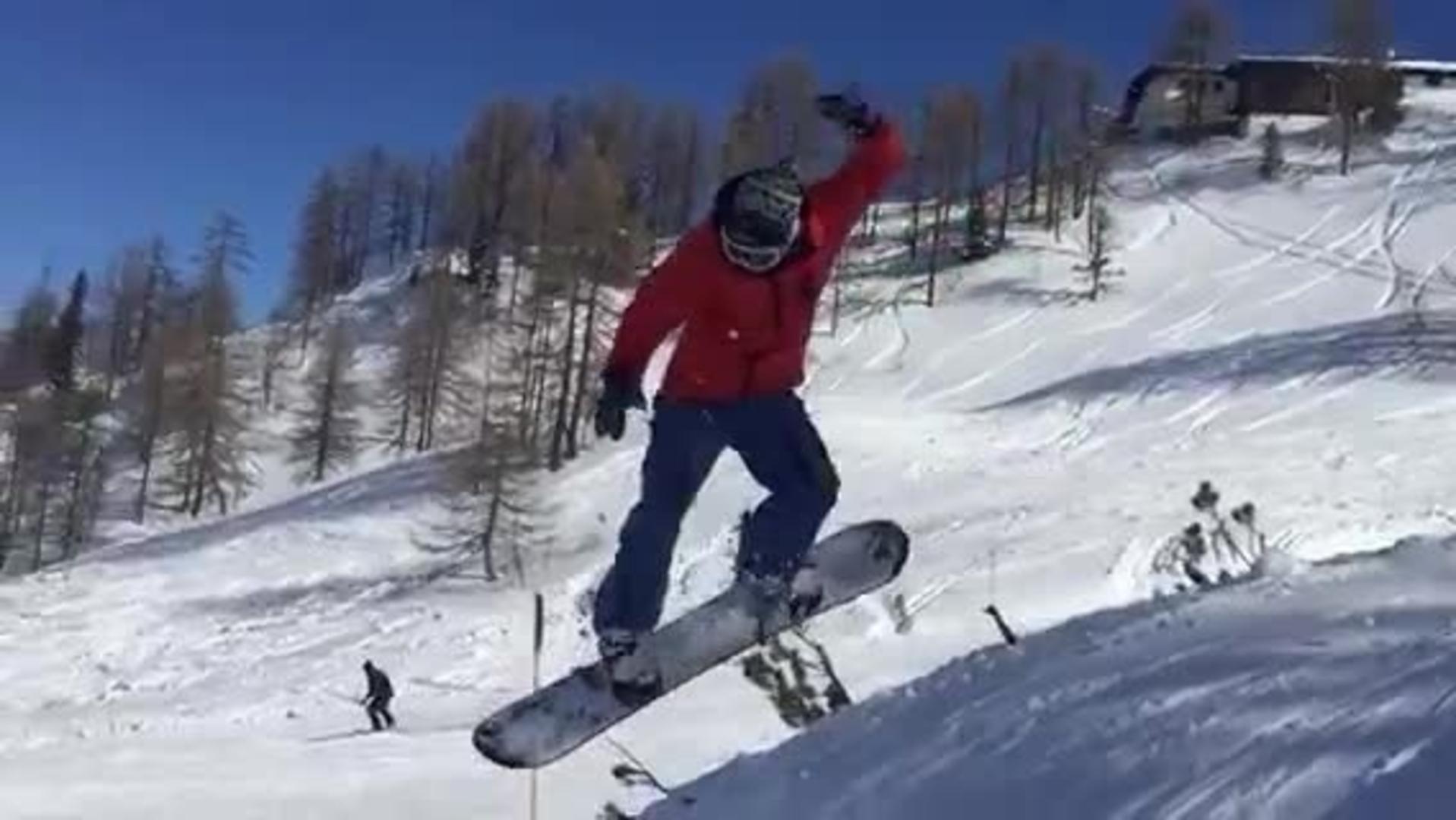 Skier Goes off Jump and Collides with Snowboarder | Jukin Media