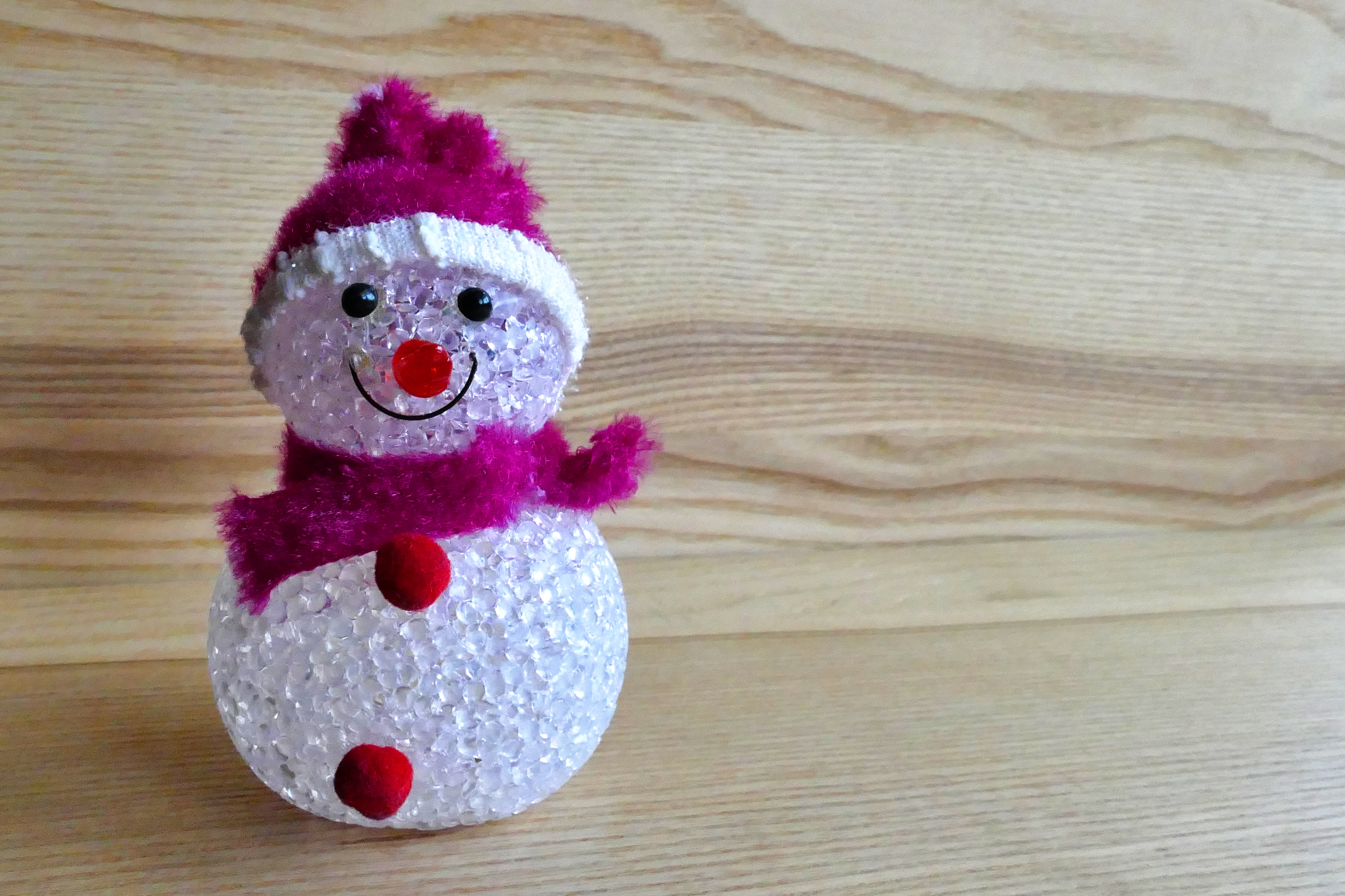 Snowman ornament in red photo