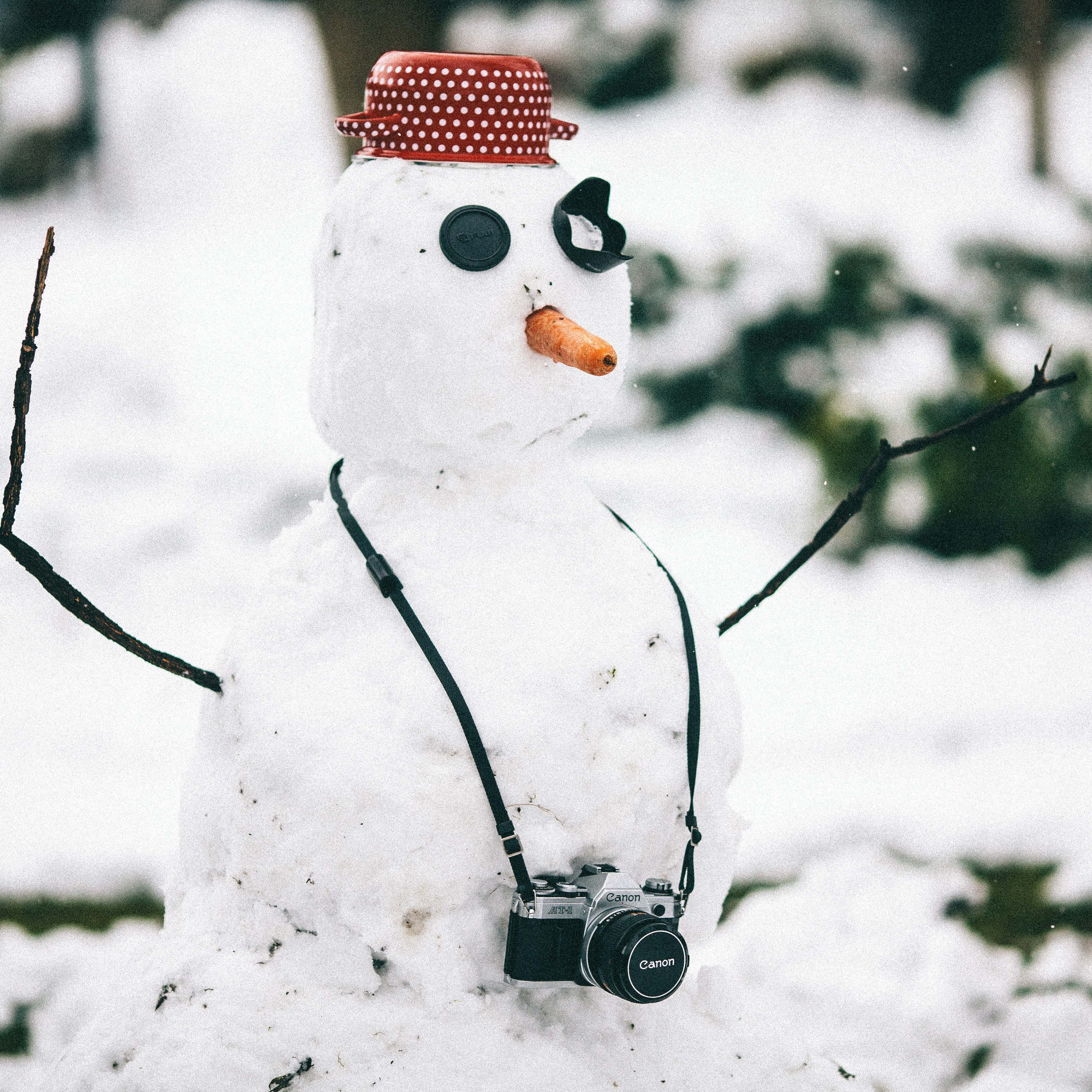 Snowman with camera photo