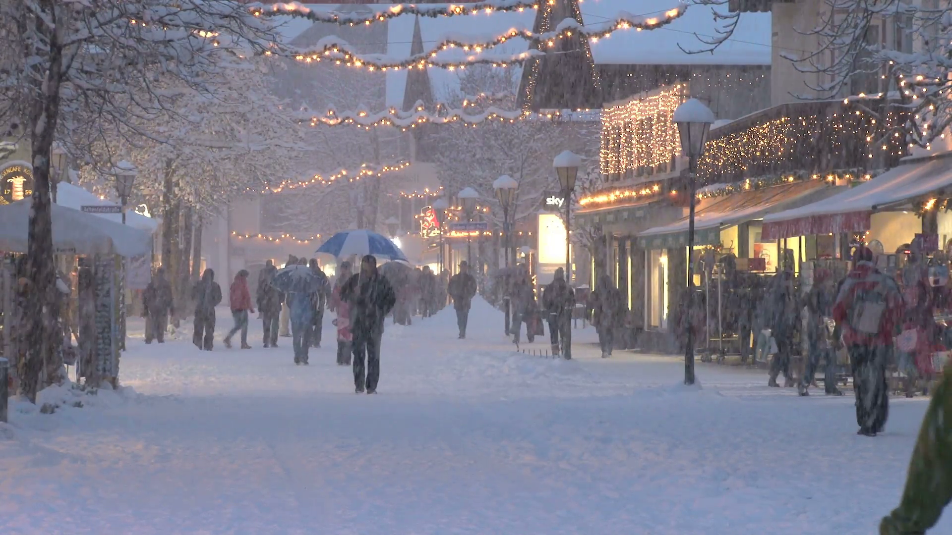 People Walking Down Snowy Street Stock Video Footage - Videoblocks