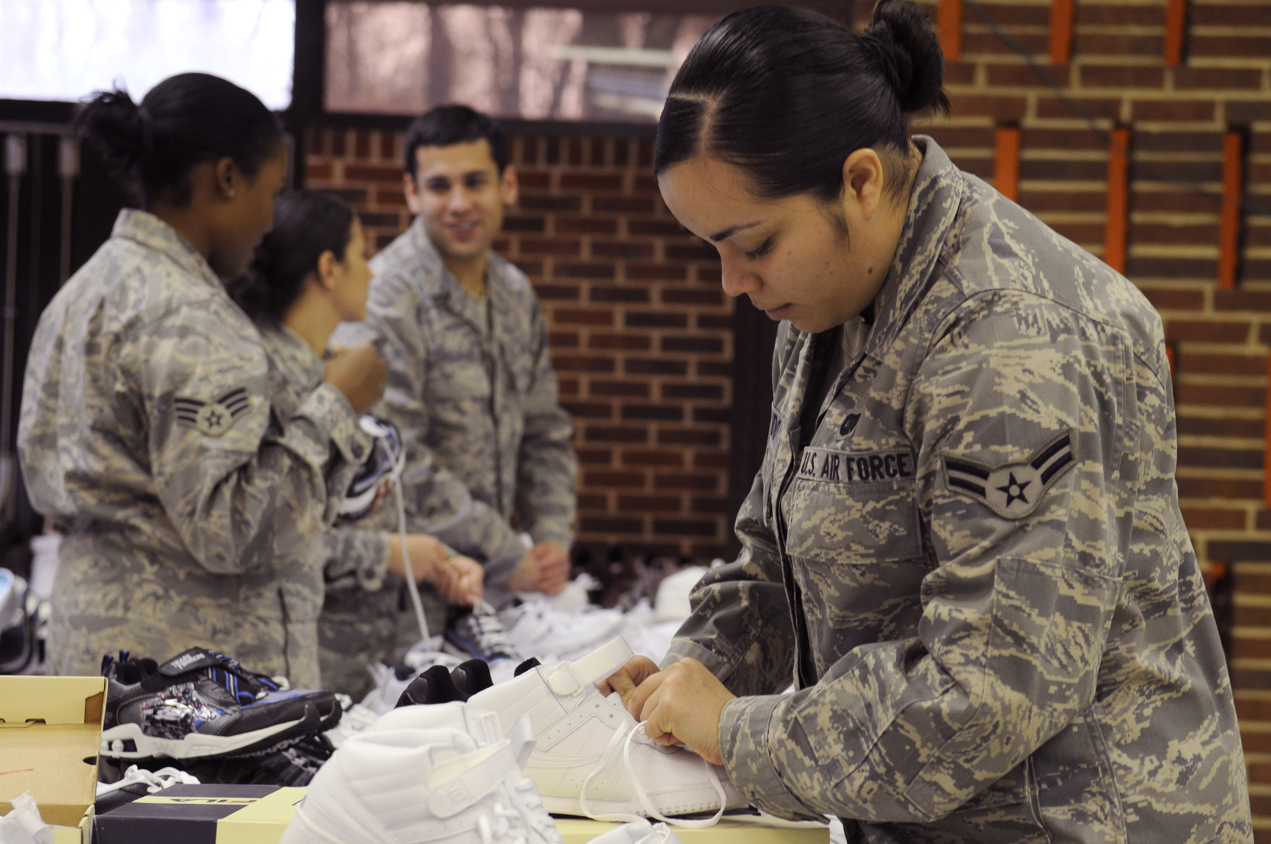 Bolling, Pentagon Airmen give time to give shoes > Air Force ...