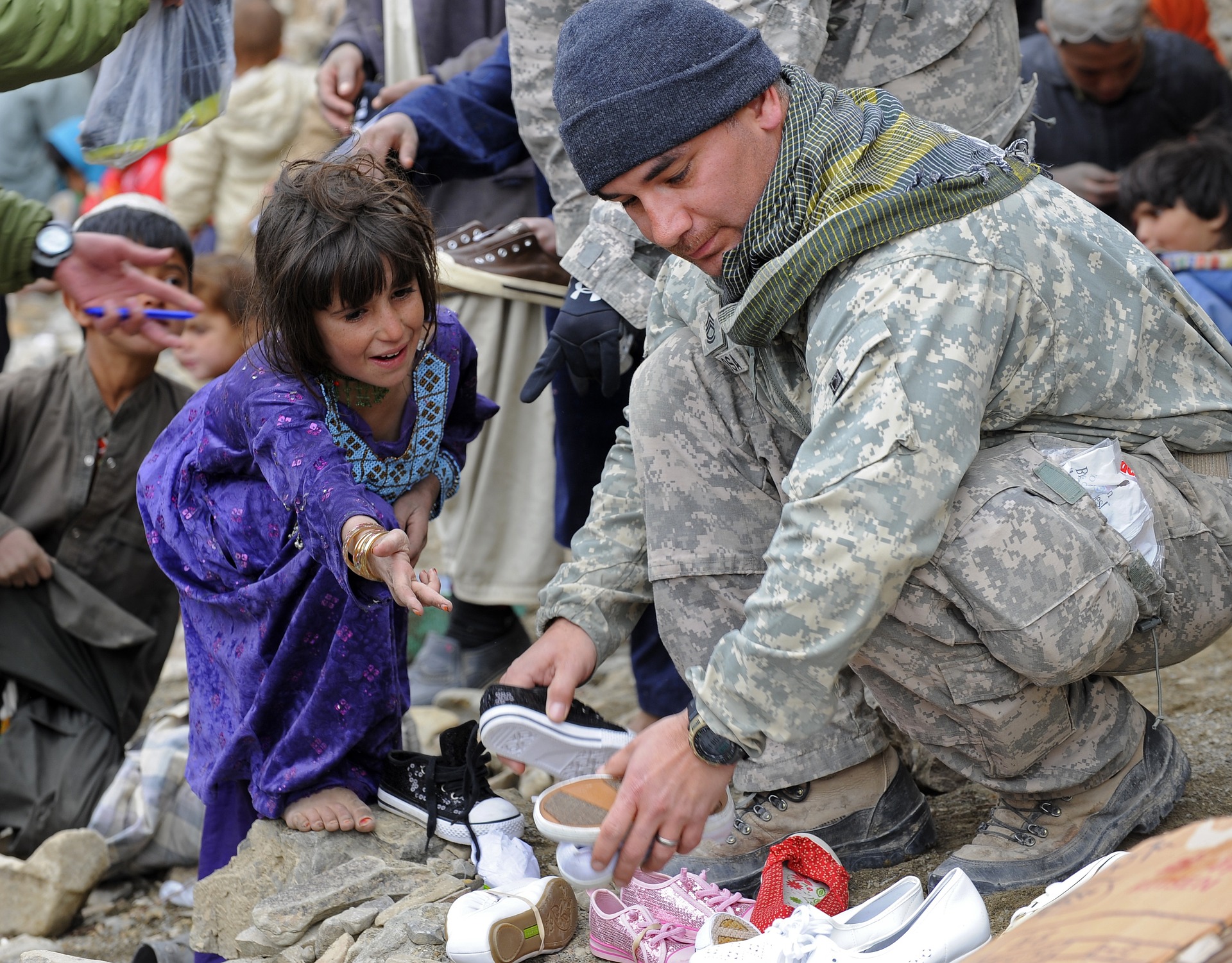 Soldier giving Shoes, Aid, Army, Help, Job, HQ Photo