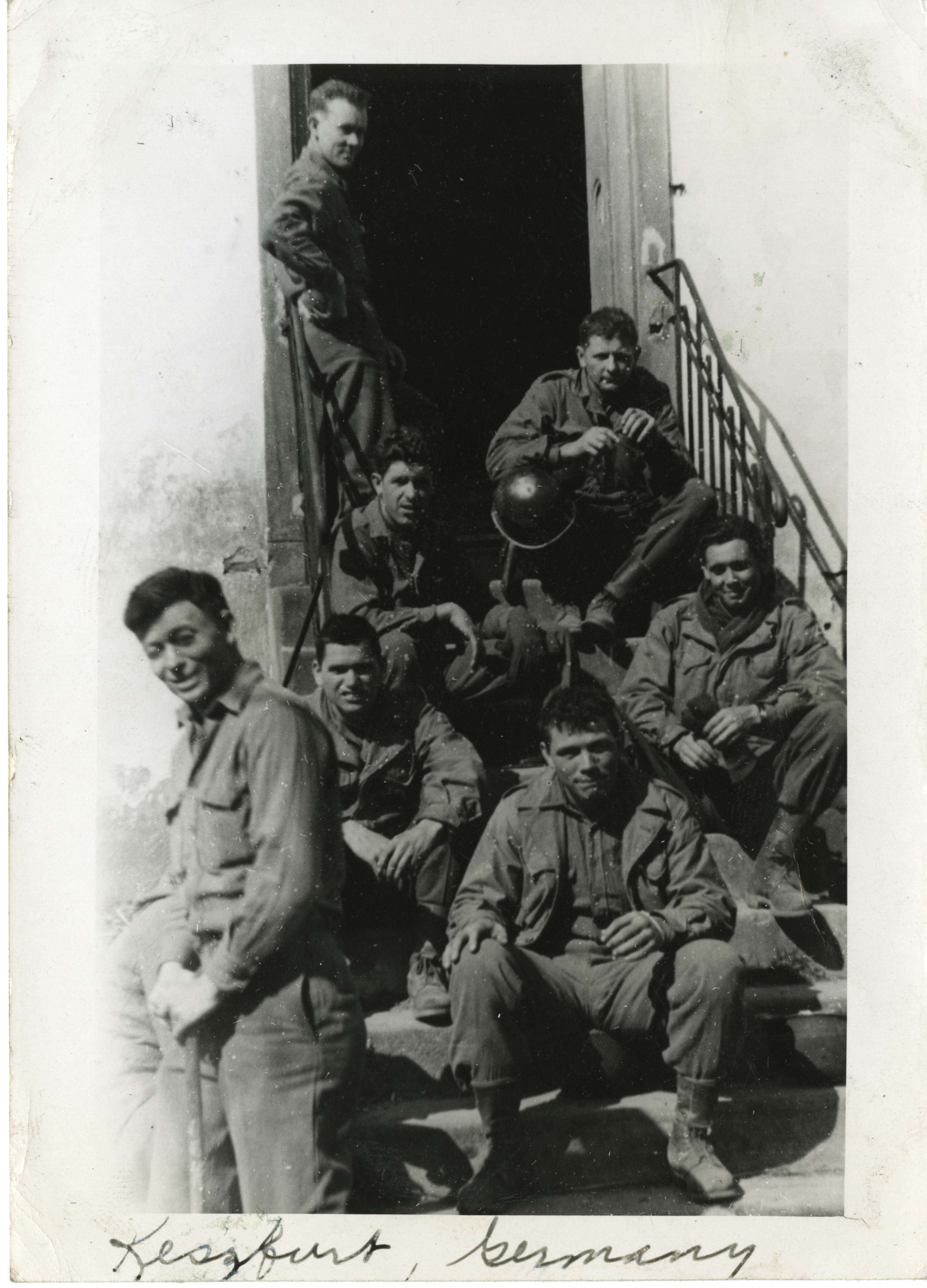 Soldiers resting on steps in Germany | The Digital Collections of ...