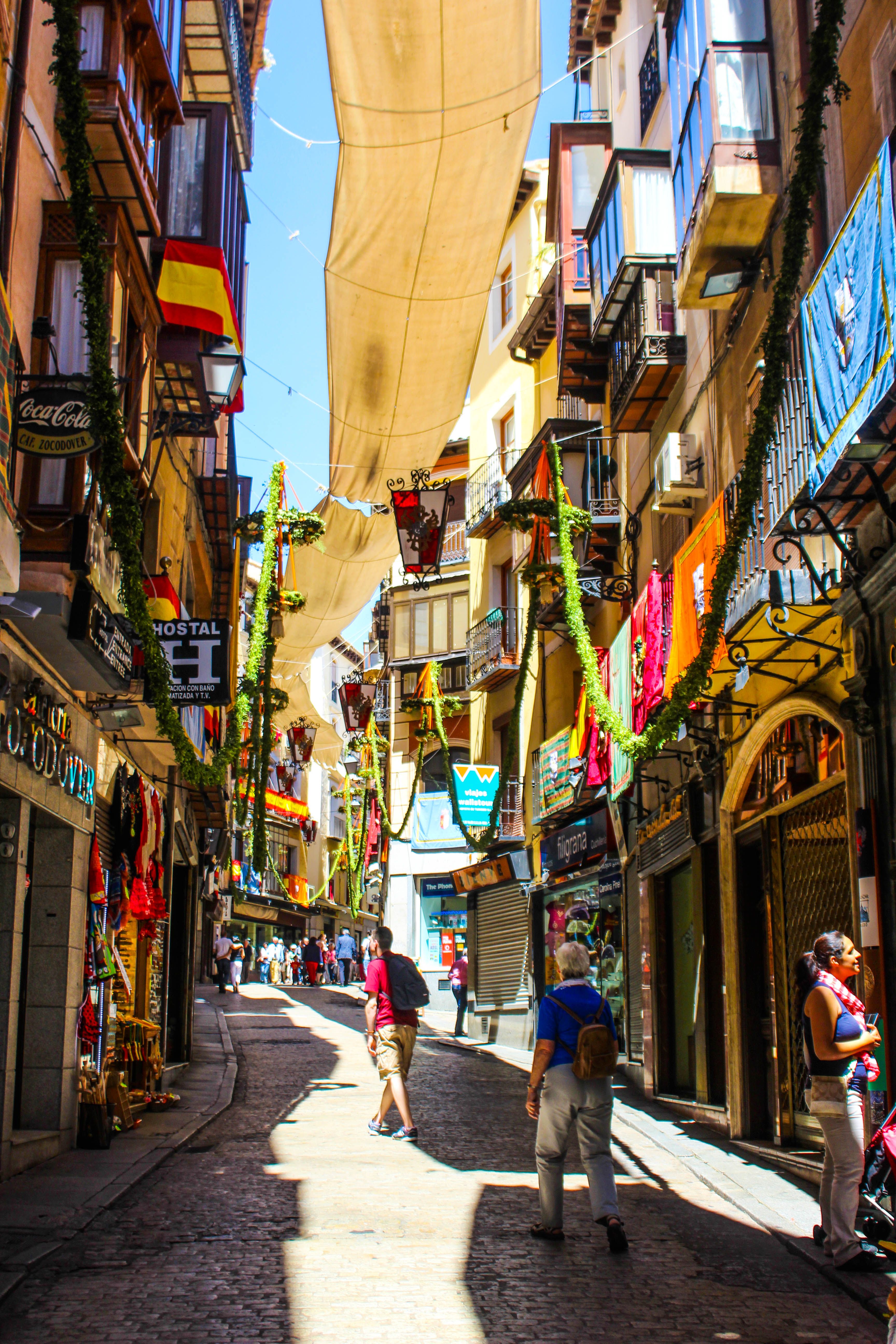 The colorful streets, lined with shopping. | STREETS | Pinterest | Spain