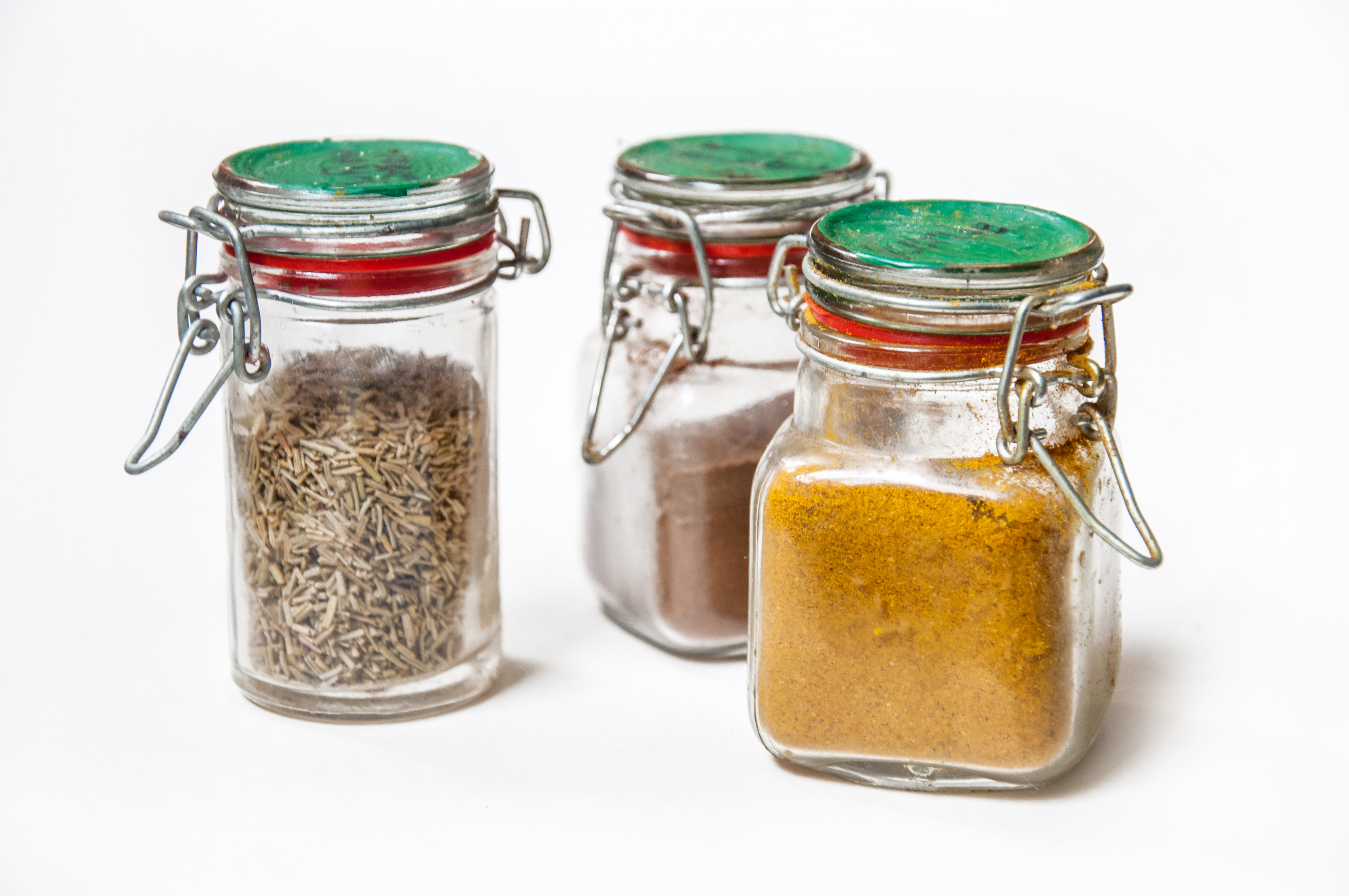 Spices and herbs in jars photo
