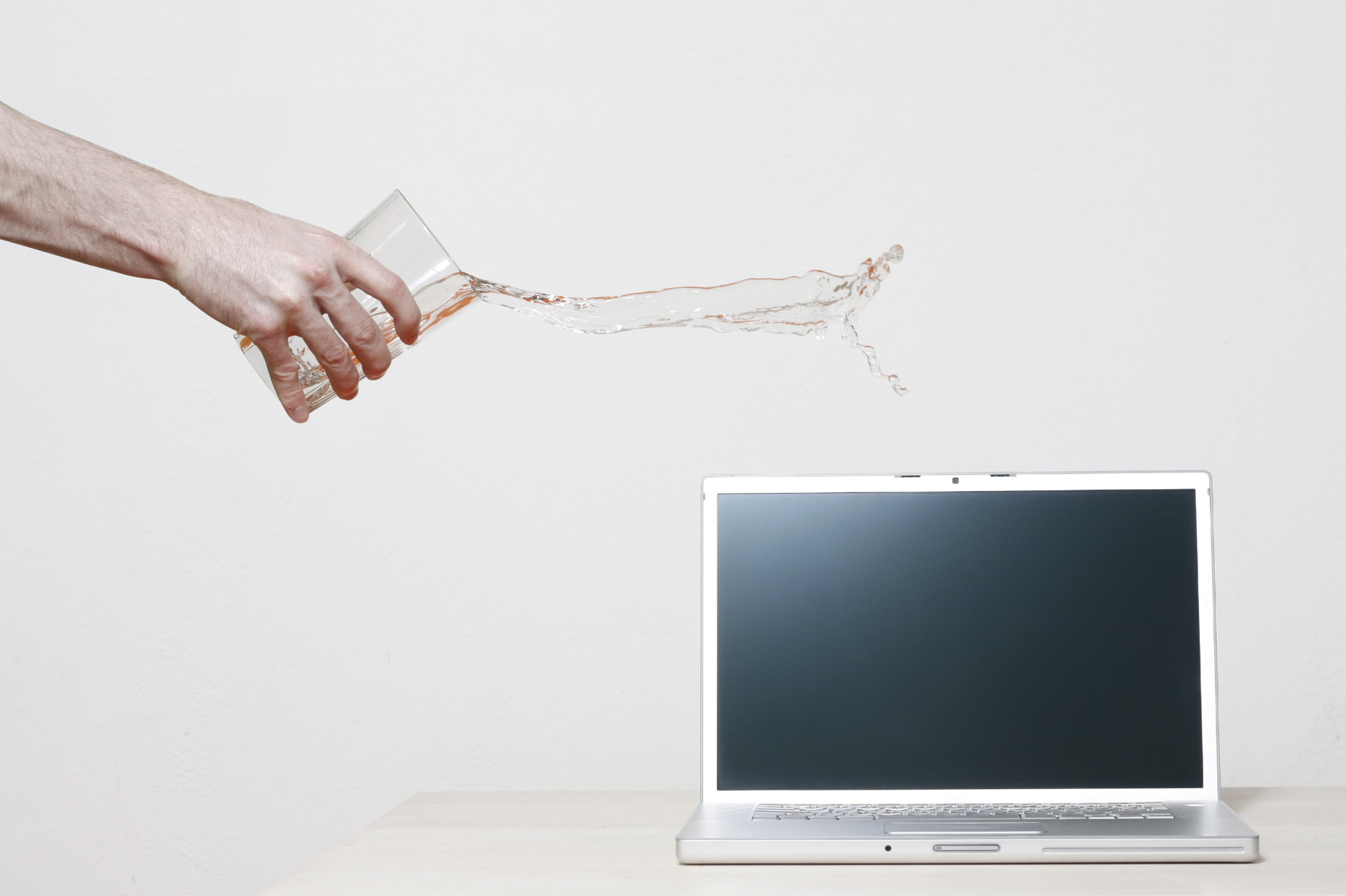 When water, coffee, or liquid spills on your laptop, do this | PCWorld