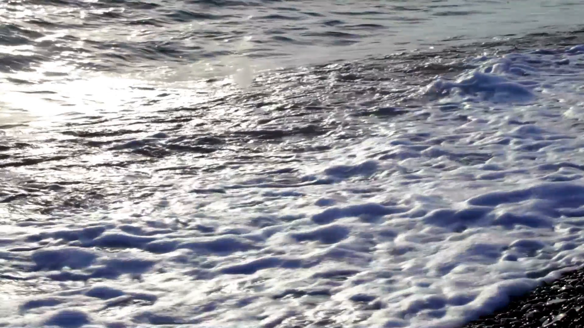 Waves of the sea splash on pebble Stock Video Footage - Videoblocks