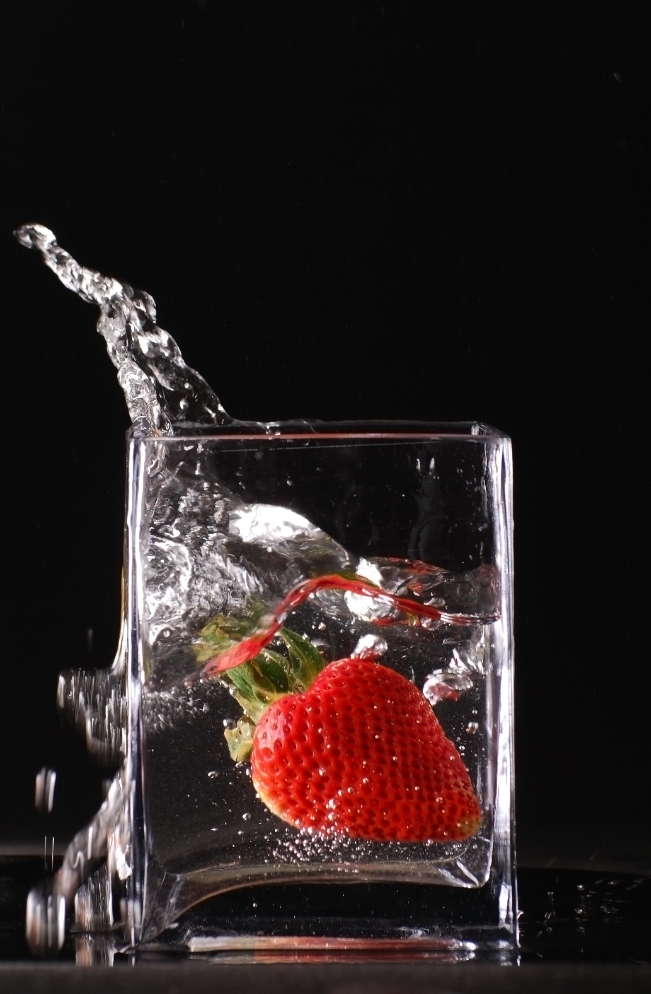 Splashing strawberry photo