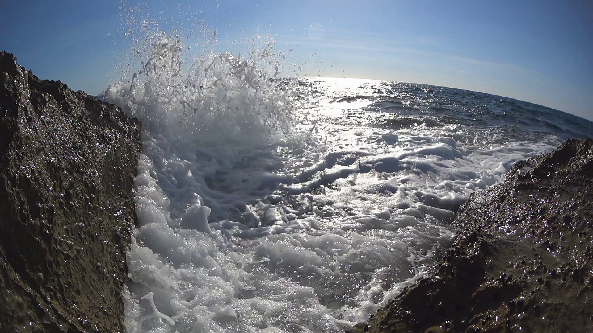 Water splashing between v-rocks to camera, real time Stock Video ...