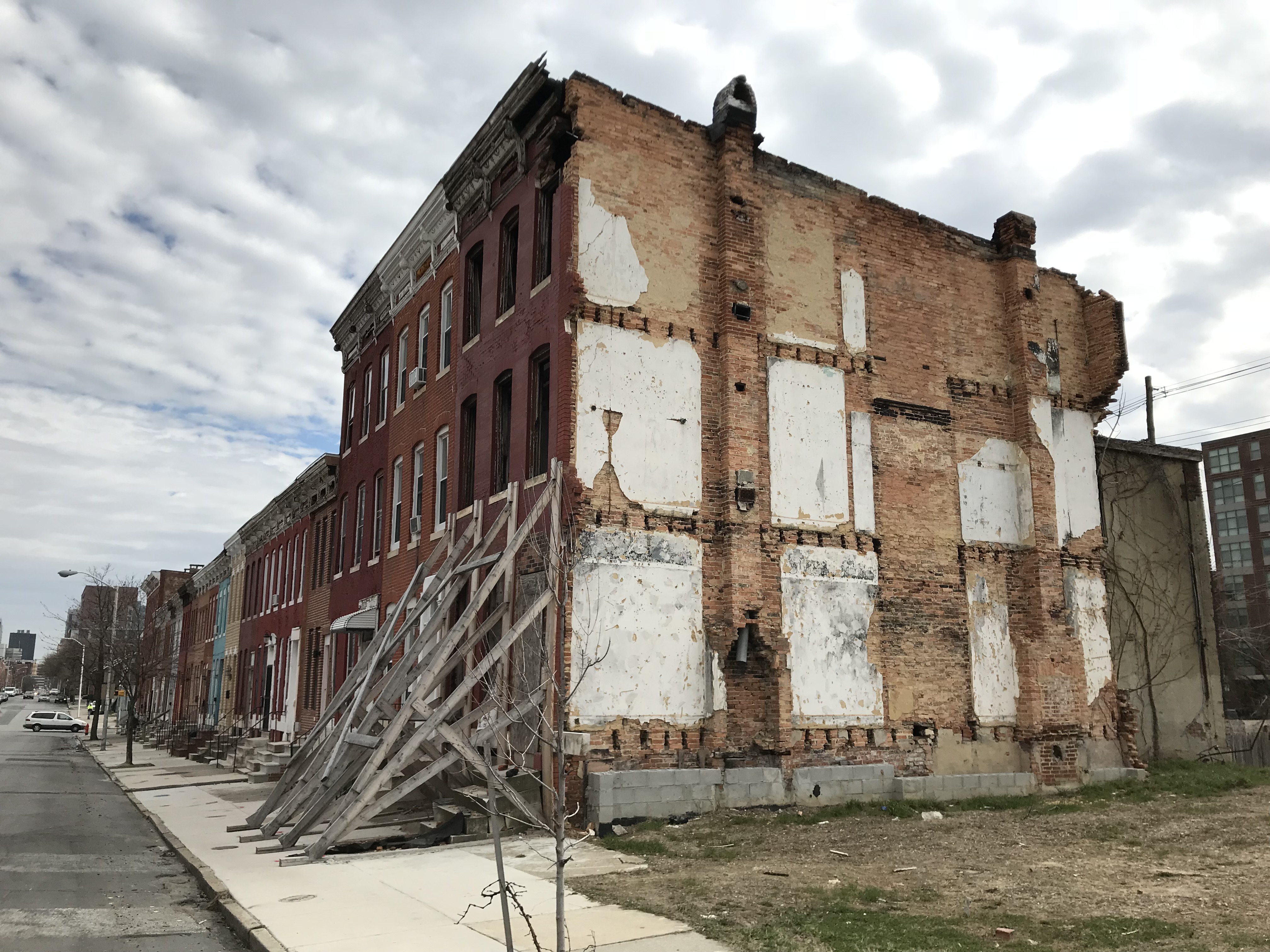 Stabilized vacant rowhouse following demolition, 1000 block of w. fayette street (south side), baltimore, md 21223 photo