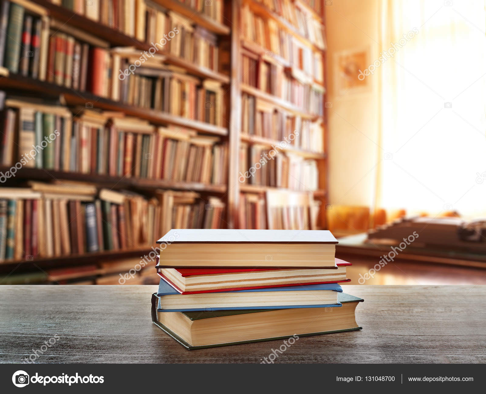 Stack of books on table — Stock Photo © belchonock #131048700