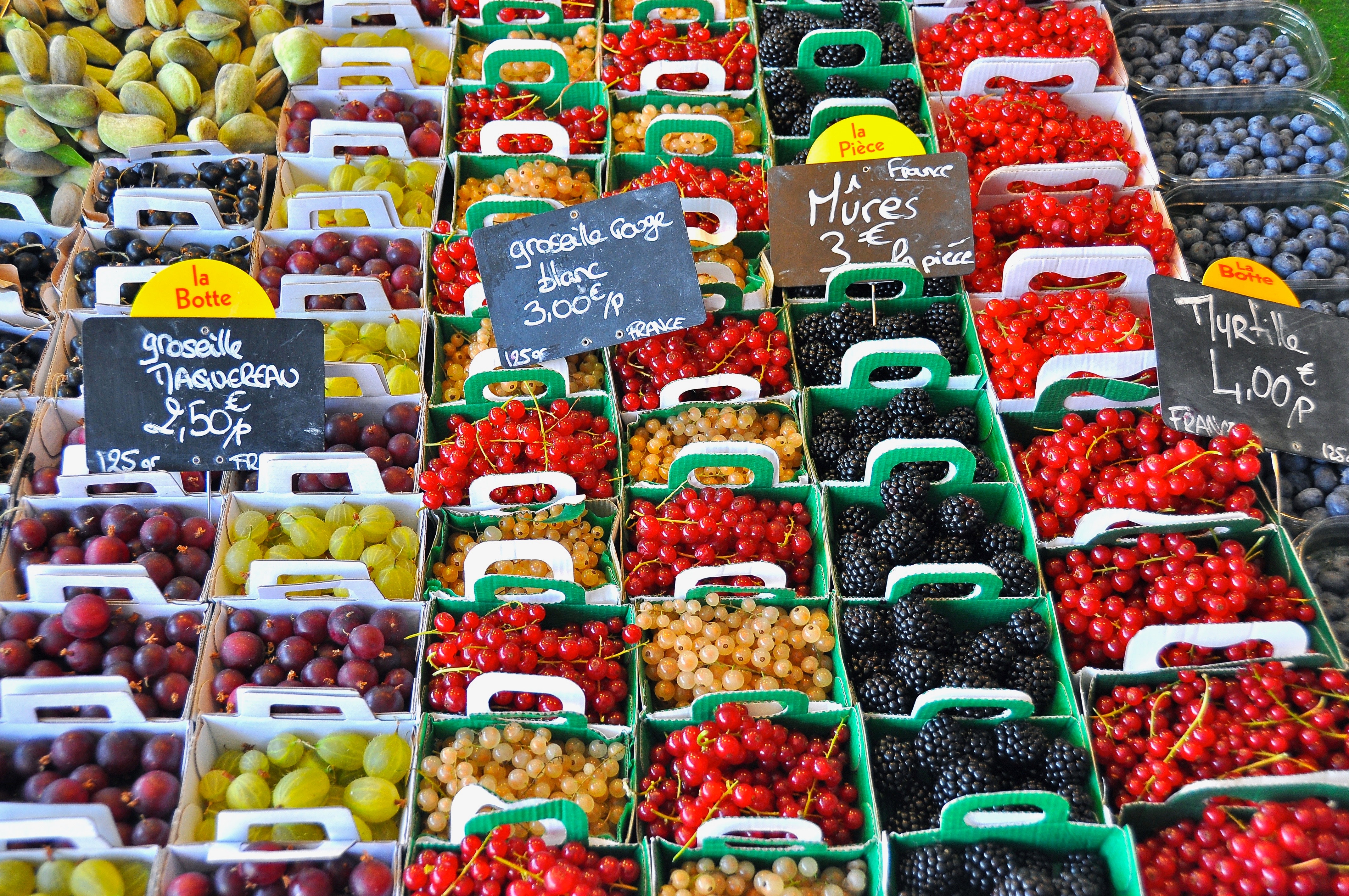 Stack of fruits with signage photo