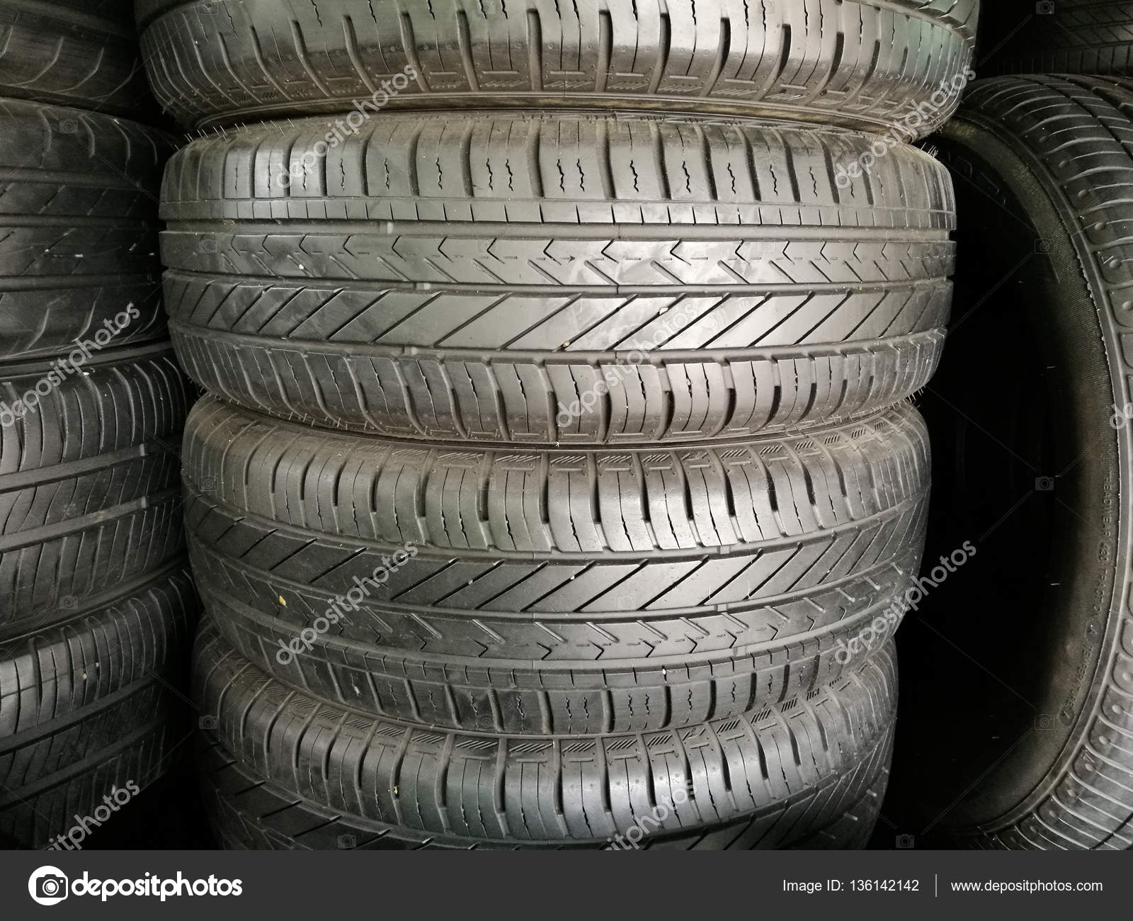 Stack of used tires for sale — Stock Photo © blanscape #136142142