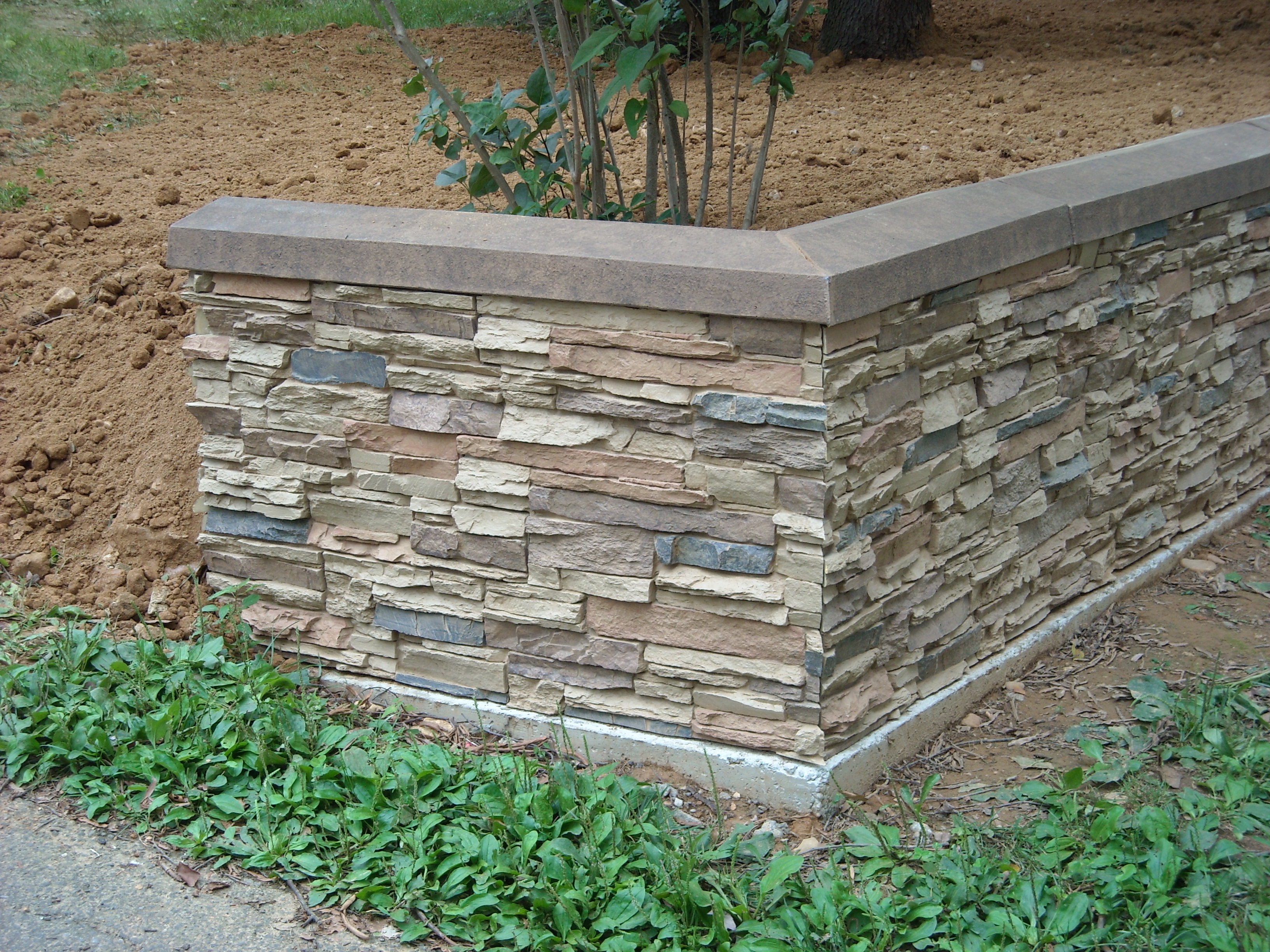 Stacked Stone Retaining Wall | Creative Faux Panels