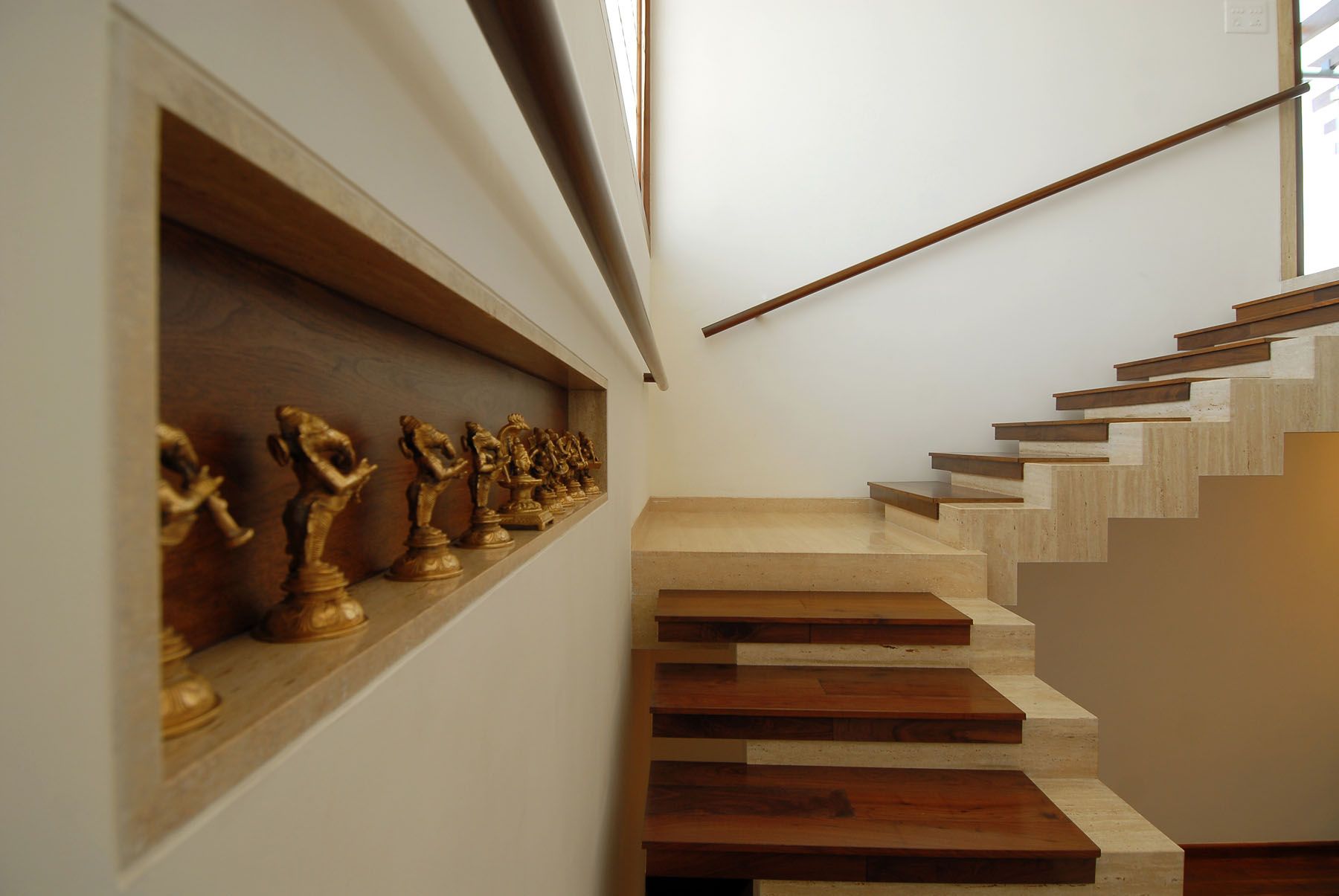 The design of a straight and superb interior staircase in a duplex ...