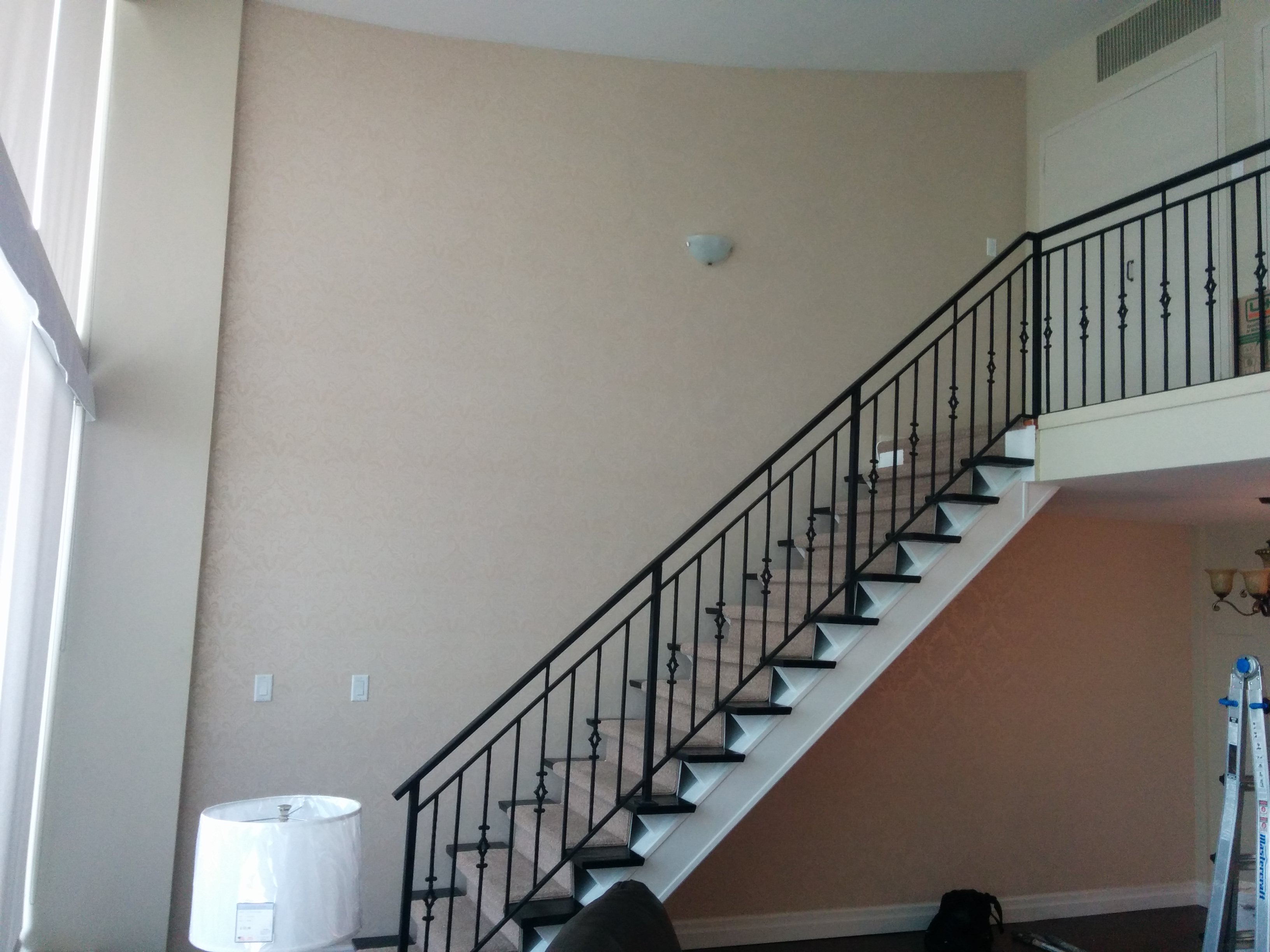 How much does it cost to paint a stairwell in Toronto? - CAM Painters
