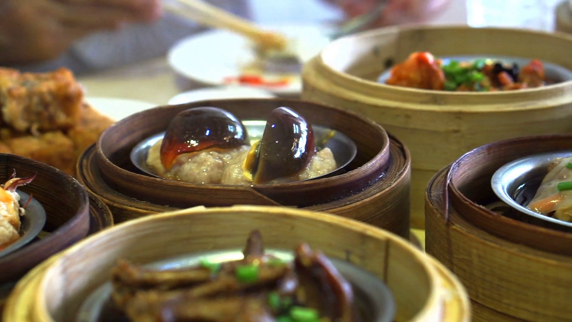 Chinese traditional food, steamed dim sum, yum cha in bamboo tray ...