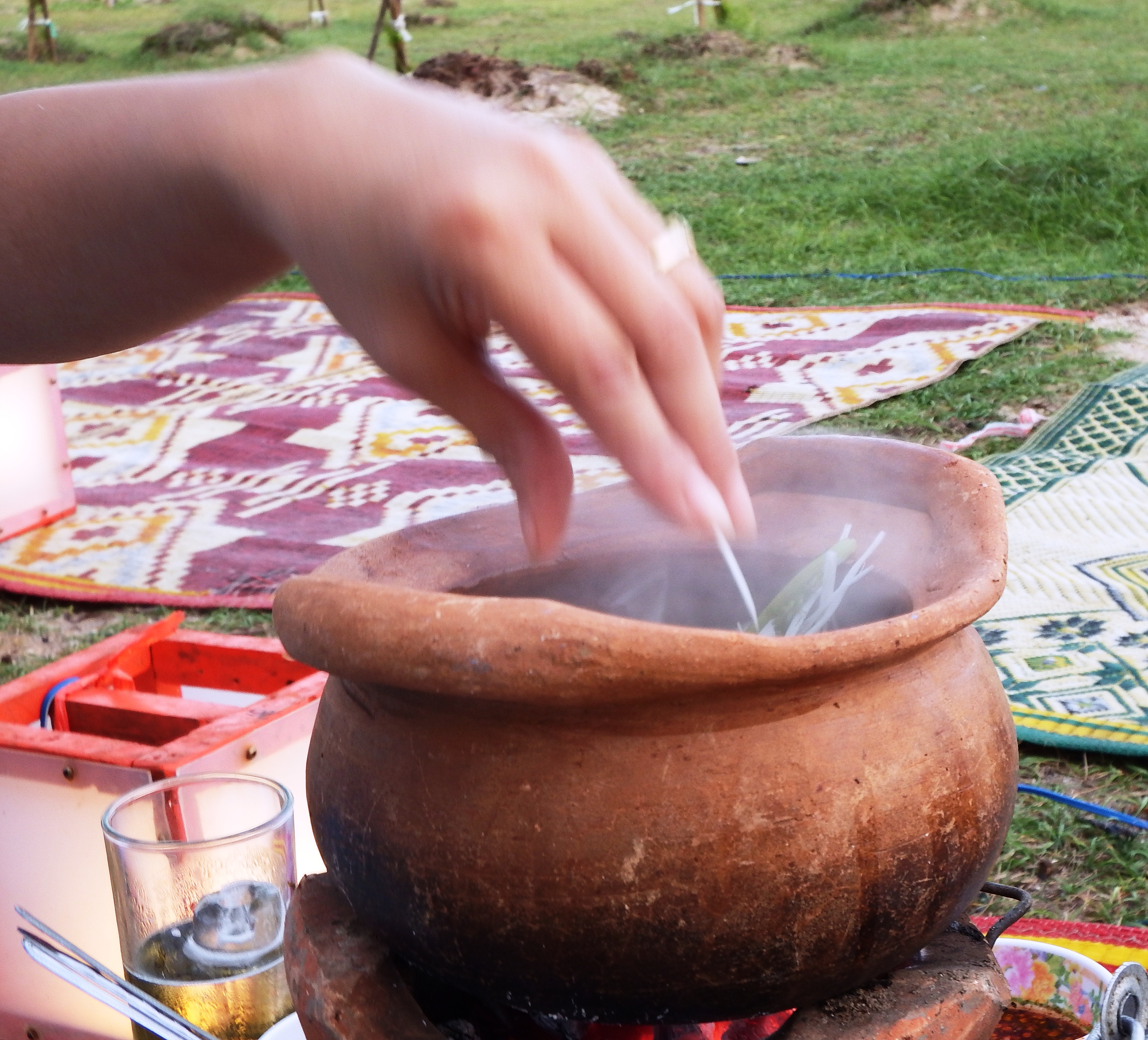 Stirring a cooking pot photo