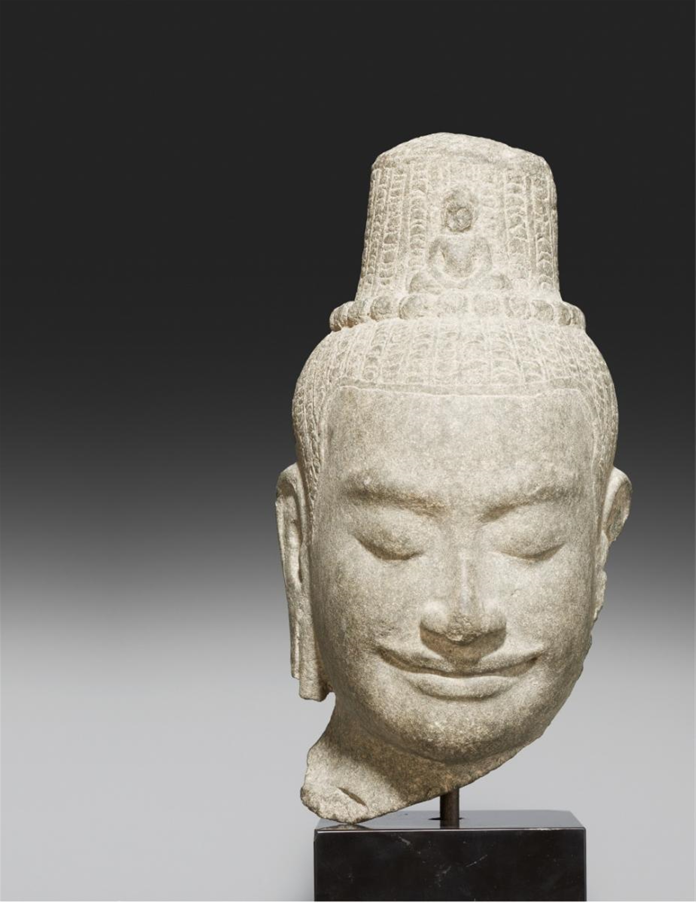 A Bayon-style stone head of a Lokeshvara. 12th/13th century ...