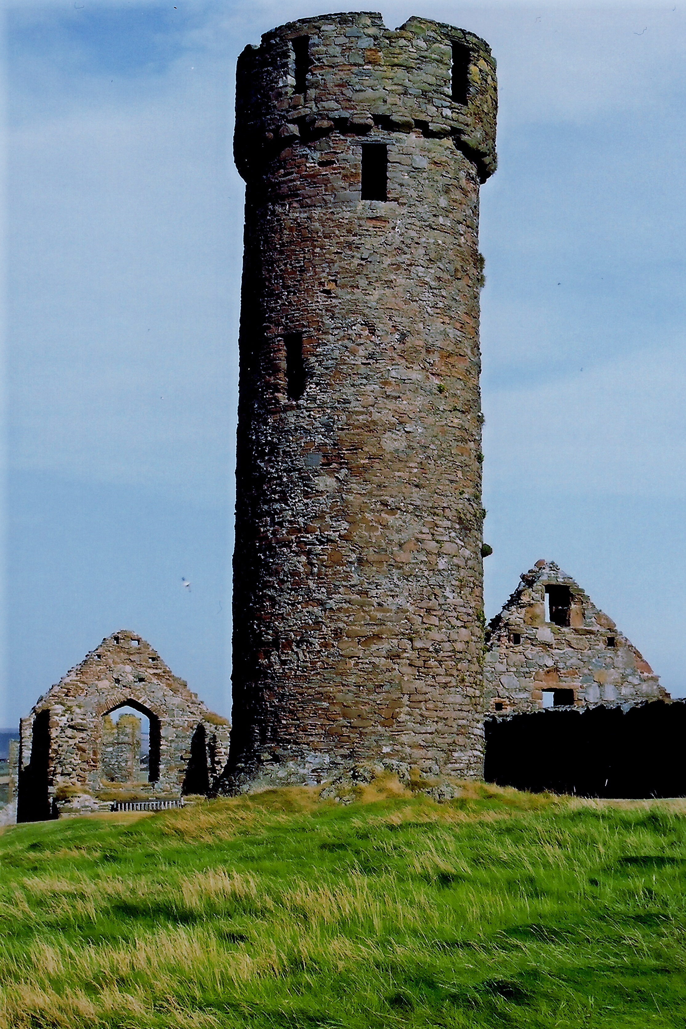 File:Peel Castle interior - Round tower and stone buildings ...