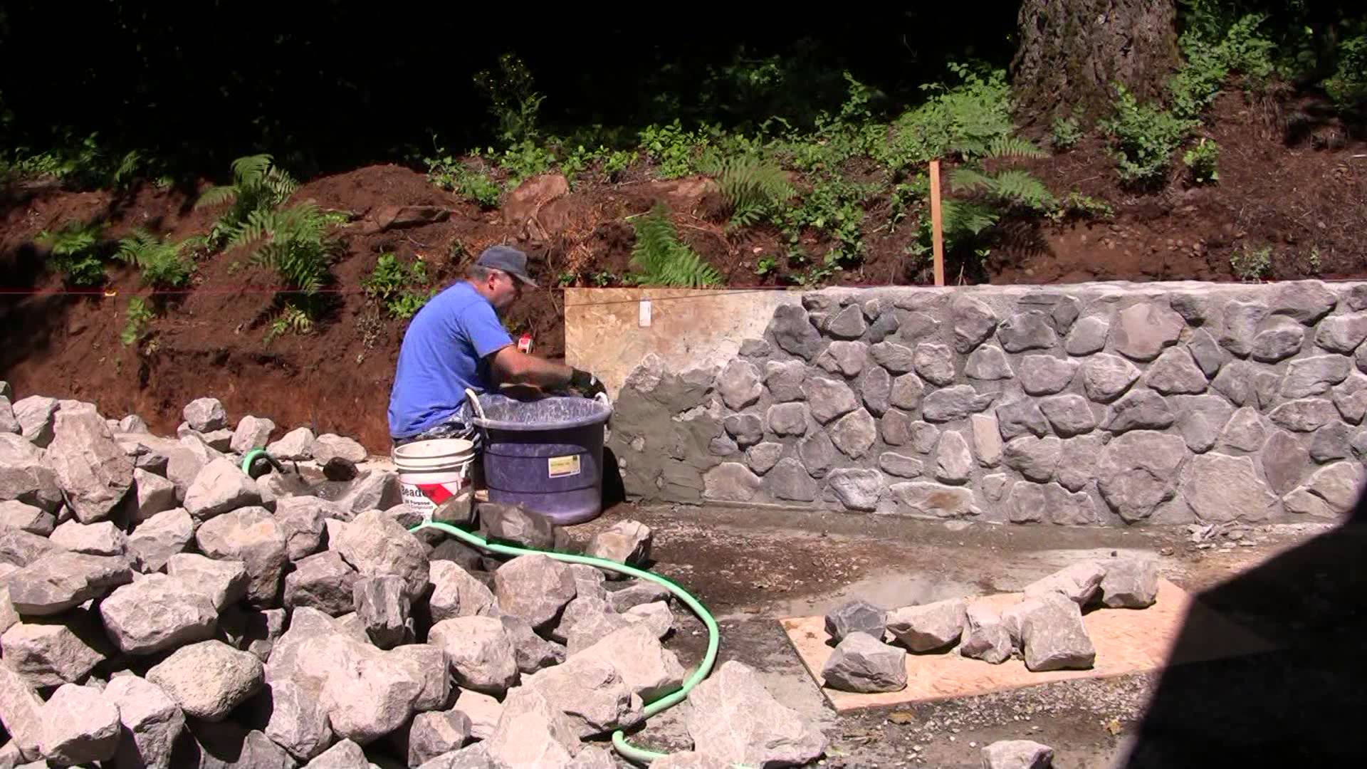 Building Stone Retaining Wall - YouTube