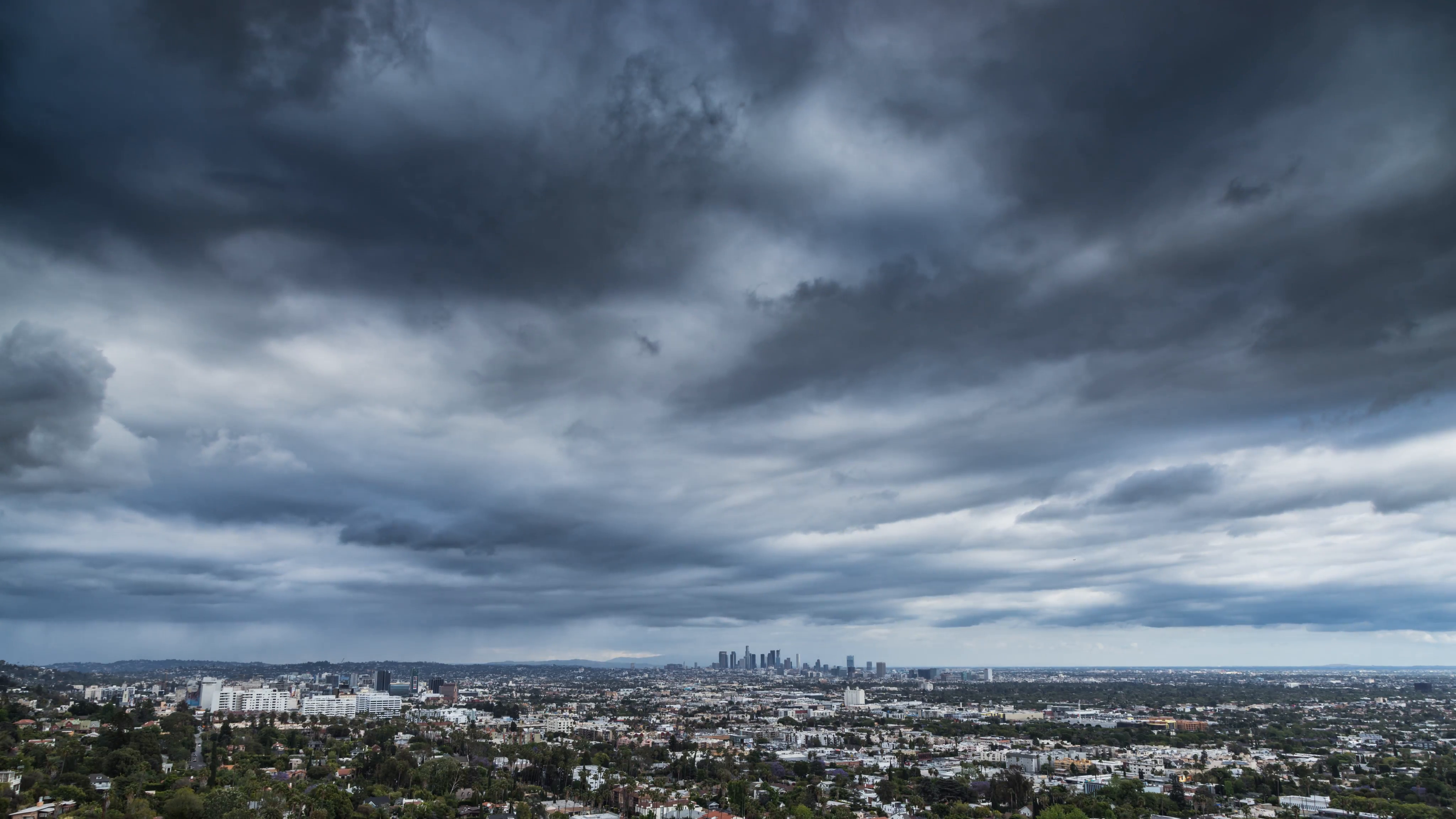 Dramatic panorama view of cloudy city of Los Angeles skyline with ...