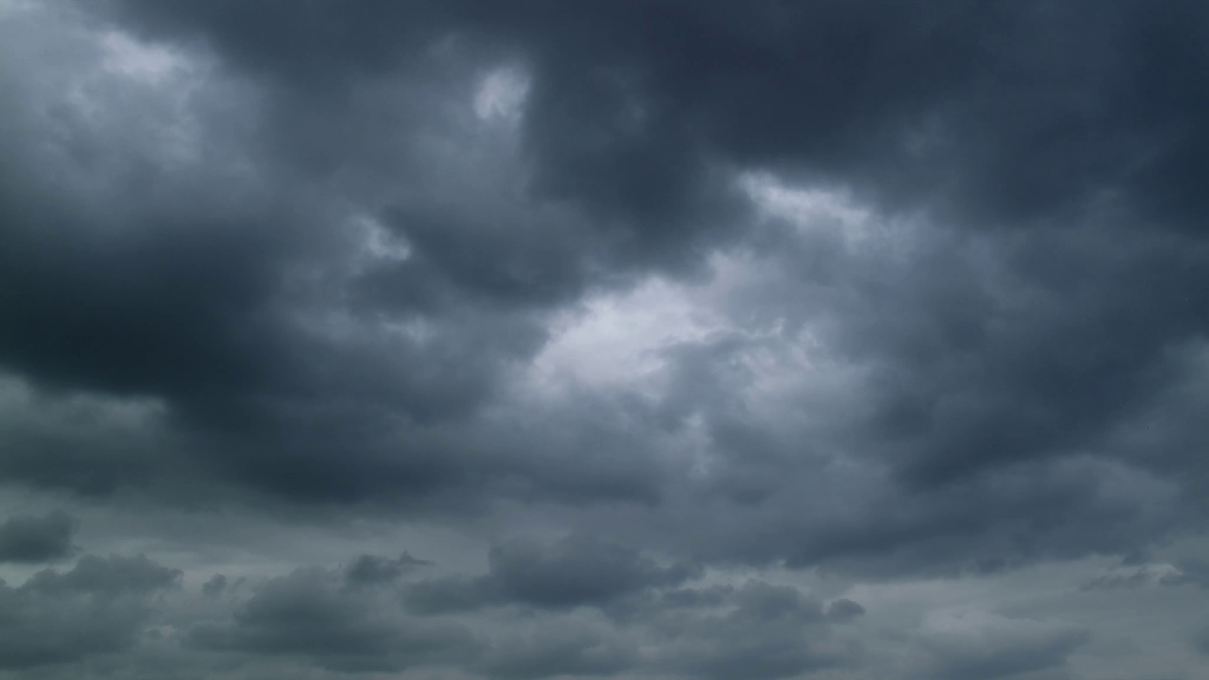 Dark grunge stormy clouds motion background. 4K UHD timelapse. Stock ...