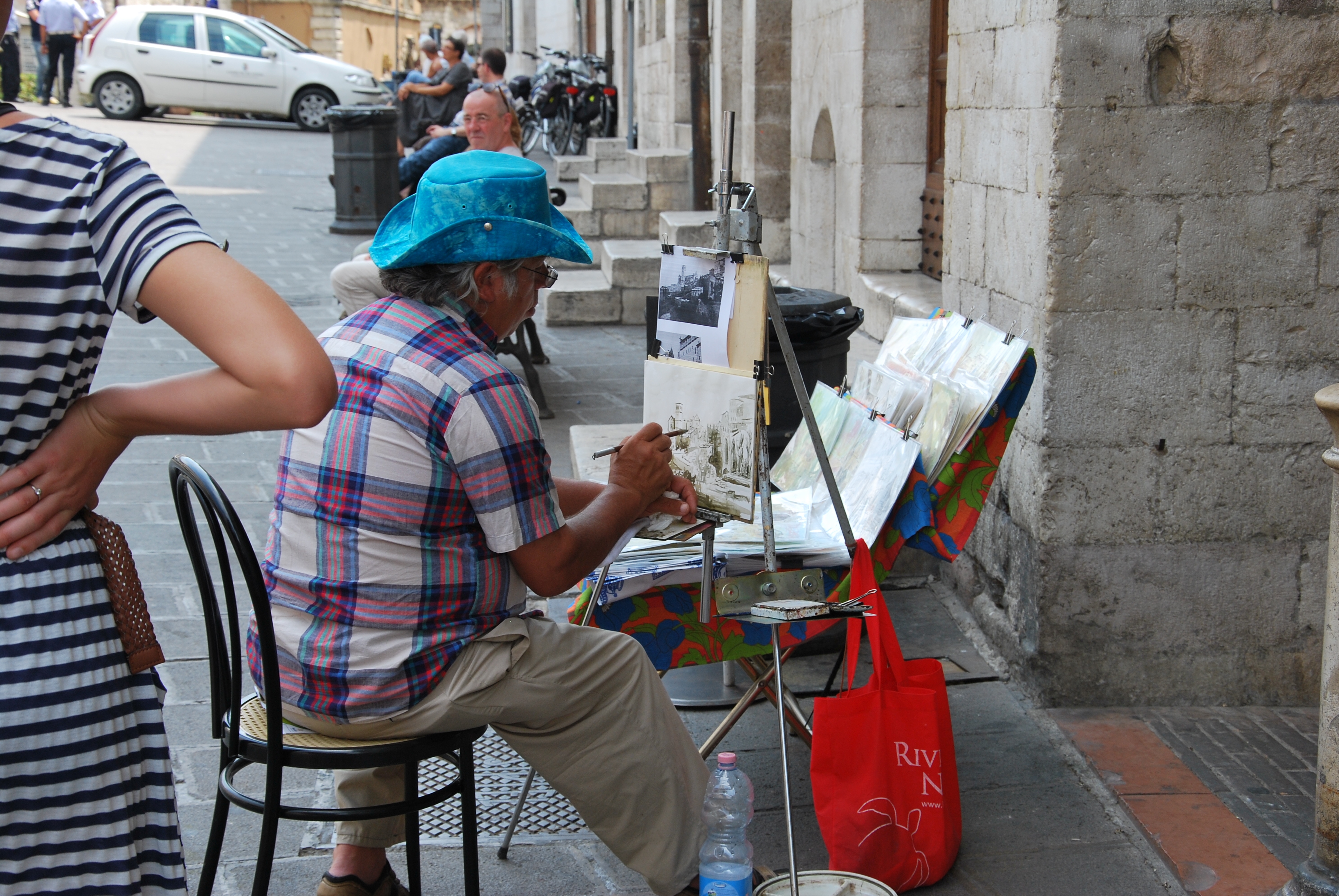 File:Street painter in Assisi.jpg - Wikimedia Commons