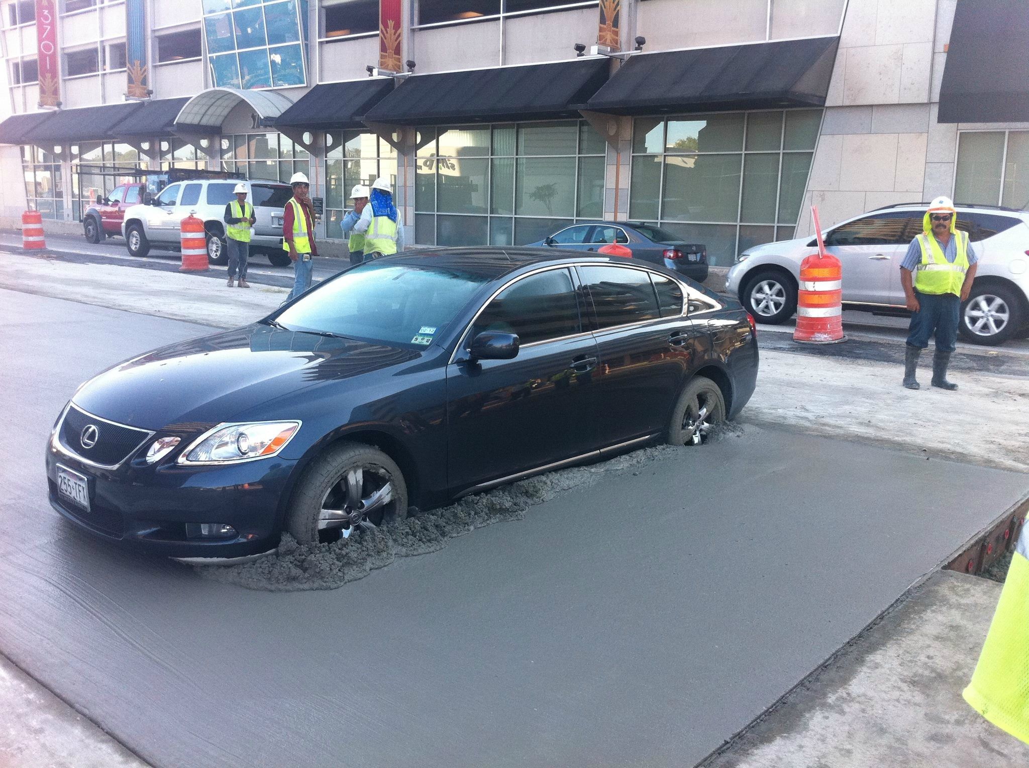 Please don't park your Lexus in concrete like this person did ...