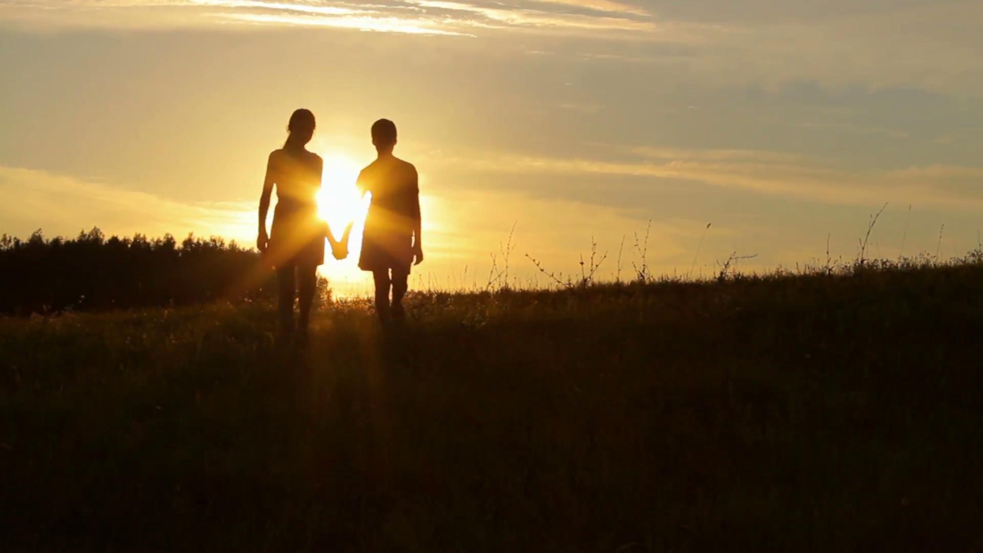 Two good friends together, sunset, peace and love, silhouettes in ...