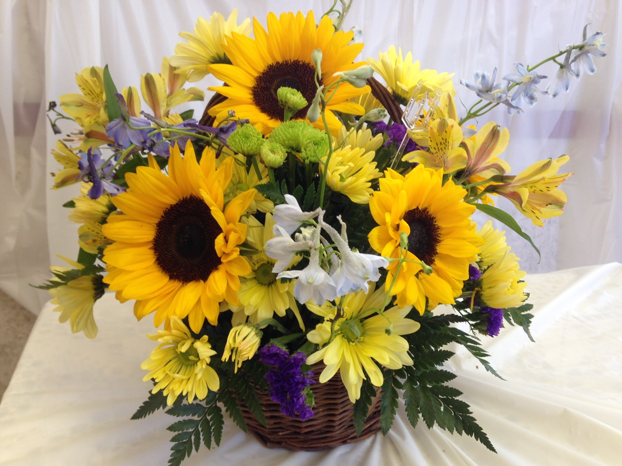 Basket of sunflowers and other bright flowers in Bristol, PA ...