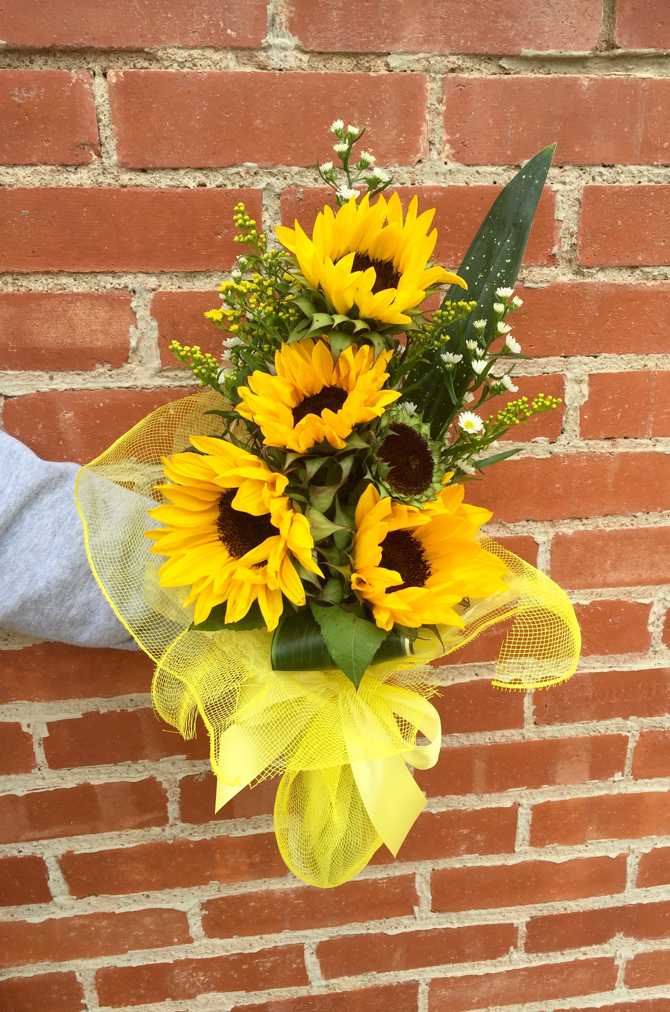 Wrapped Sunflowers for presentation. in Pratt, KS | The Flower Shoppe