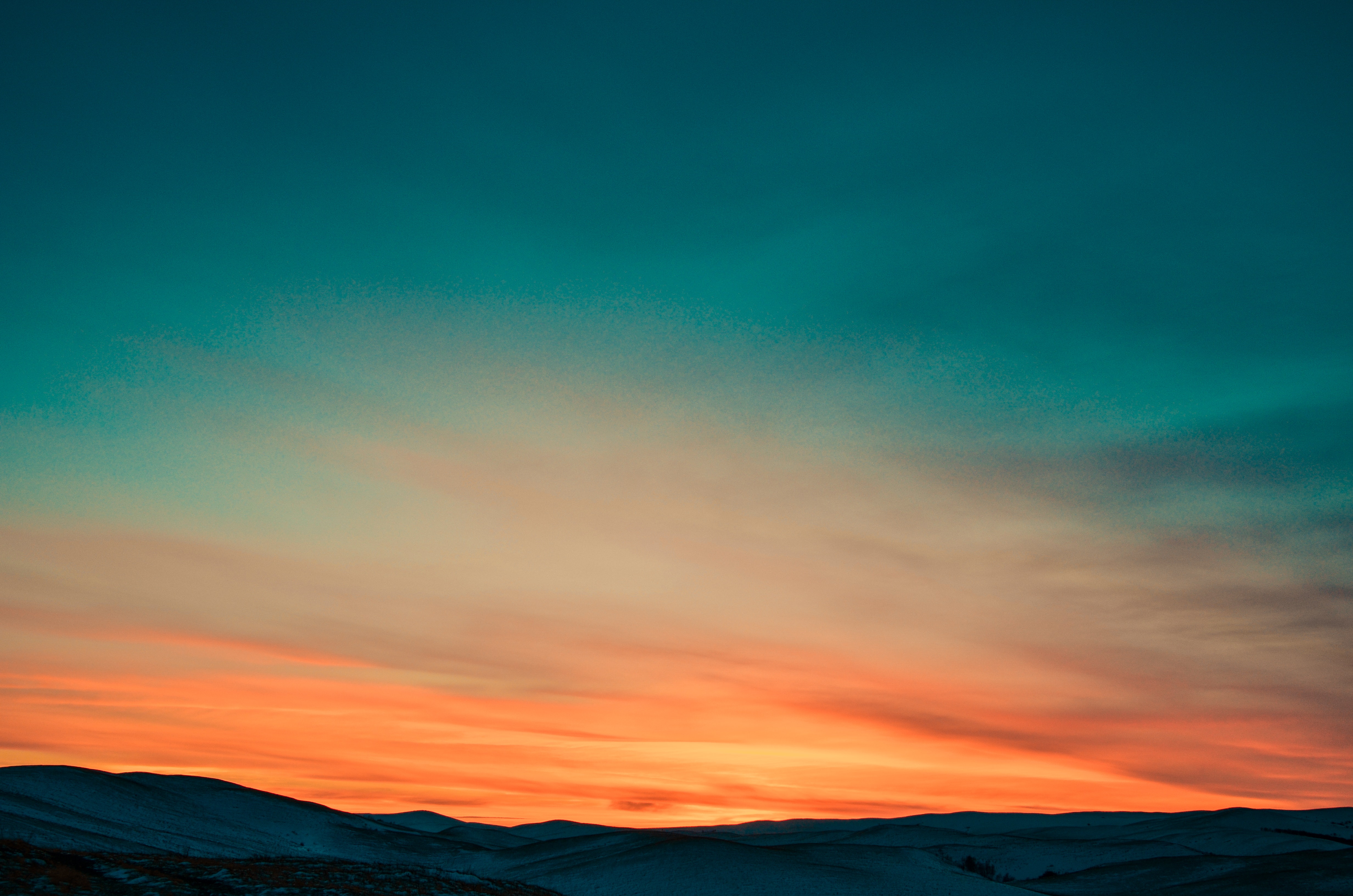 Sunset over Snow Covered Mountains · Free Stock Photo