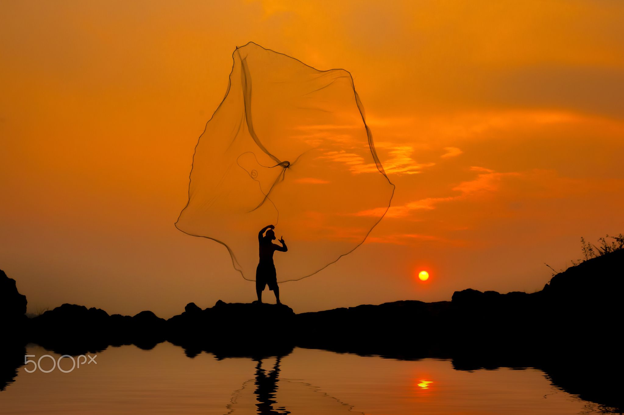 Fisherman fishing at sunset, Vietnam by Visoot Uthairam on 500px ...